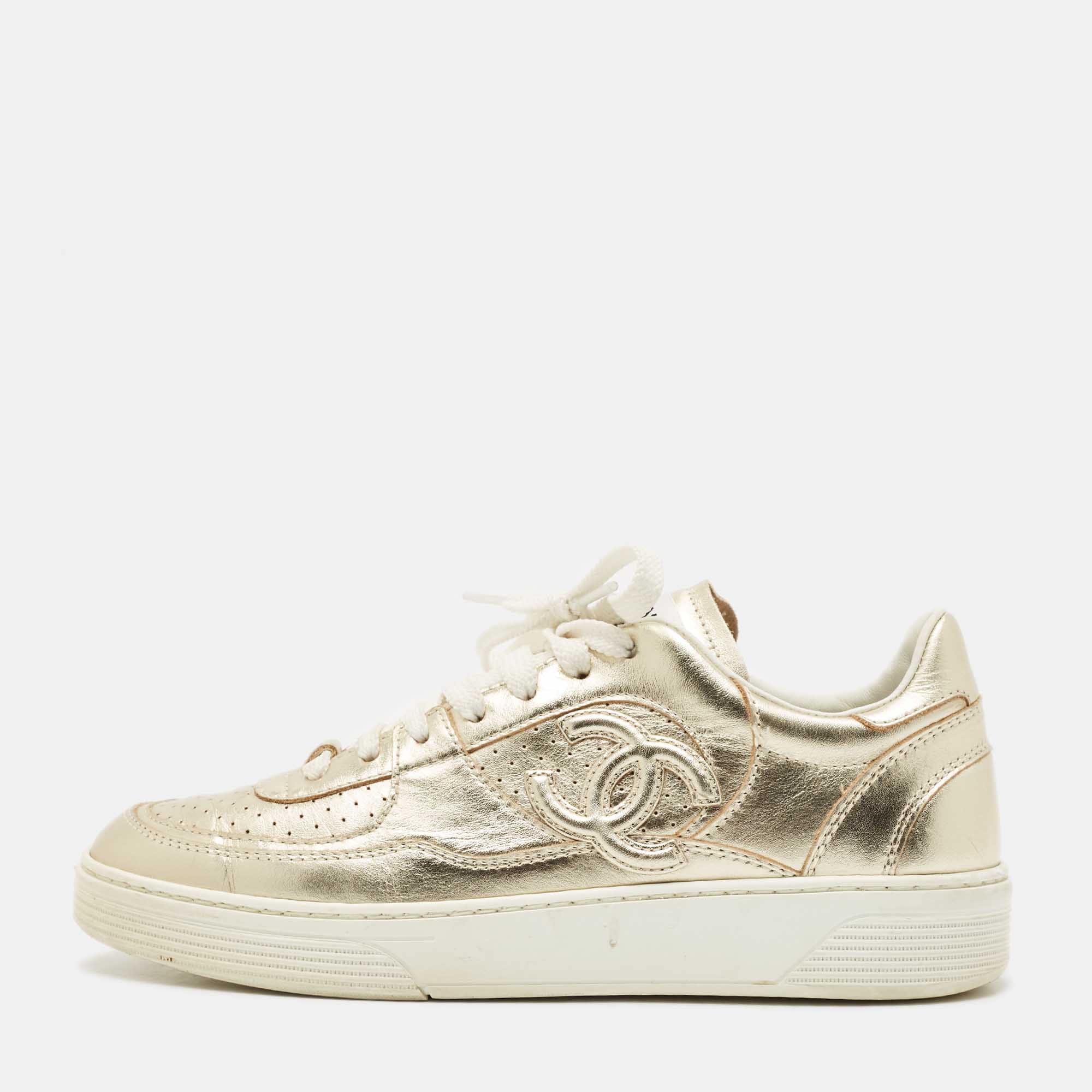 

Chanel Gold Leather CC Low Top Sneakers Size