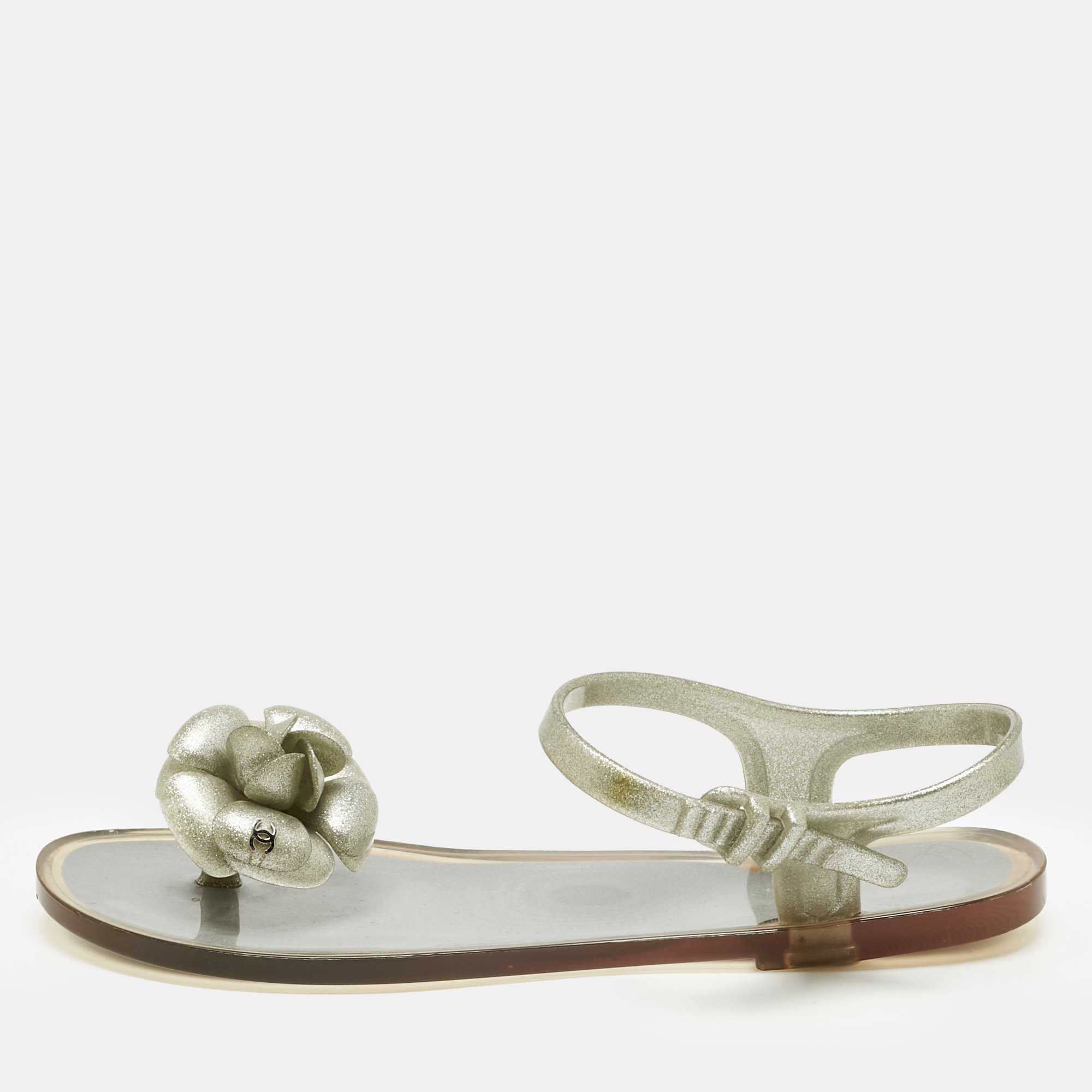 

Chanel Metallic Silver Jelly Camellia Ankle Strap Sandals Size