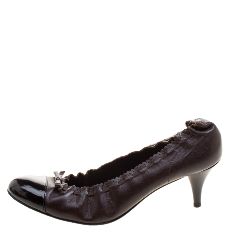 

Chanel Brown/Black Leather Cap Toe Pumps Size