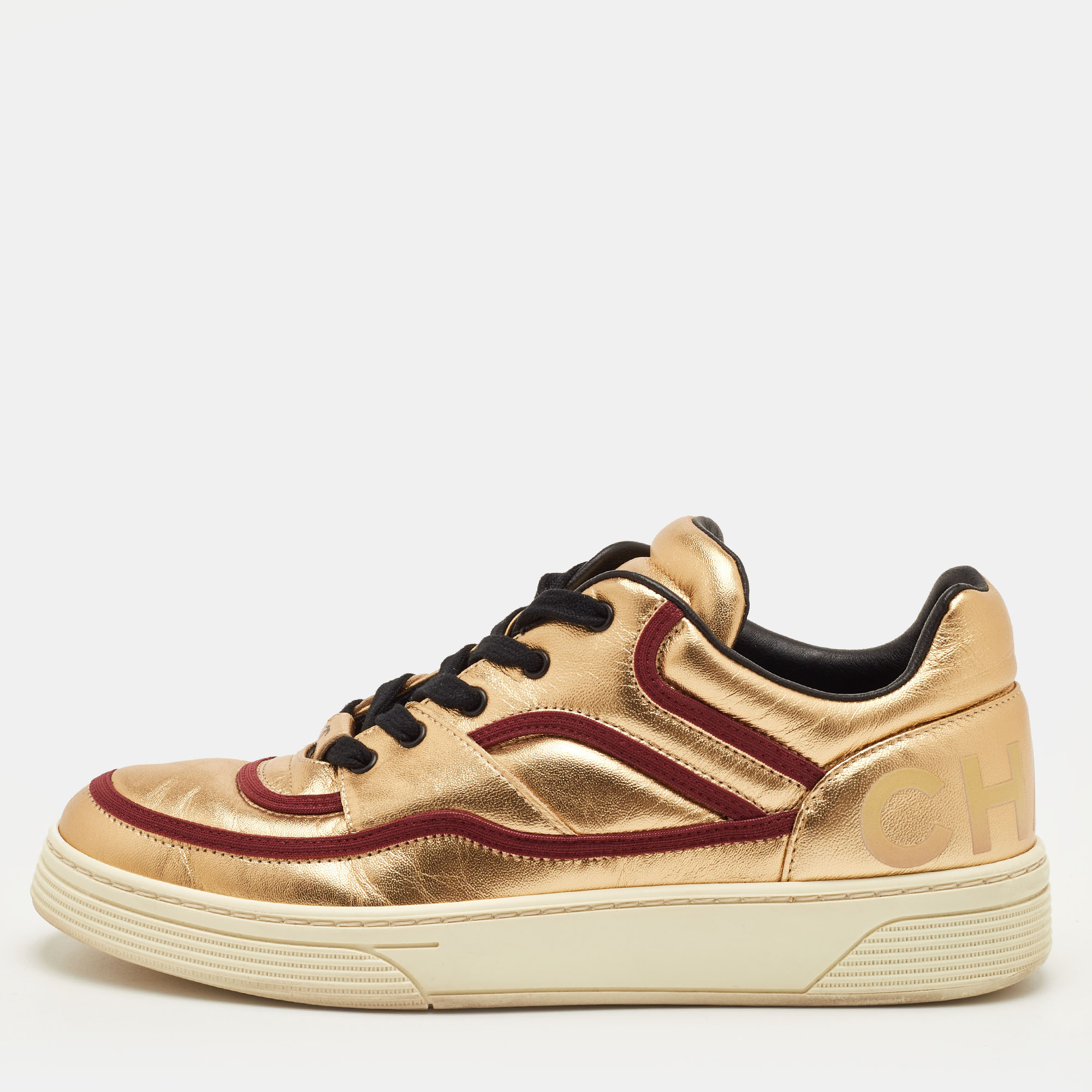

Chanel CC Size  Gold/Burgundy Leather Low Top Sneakers