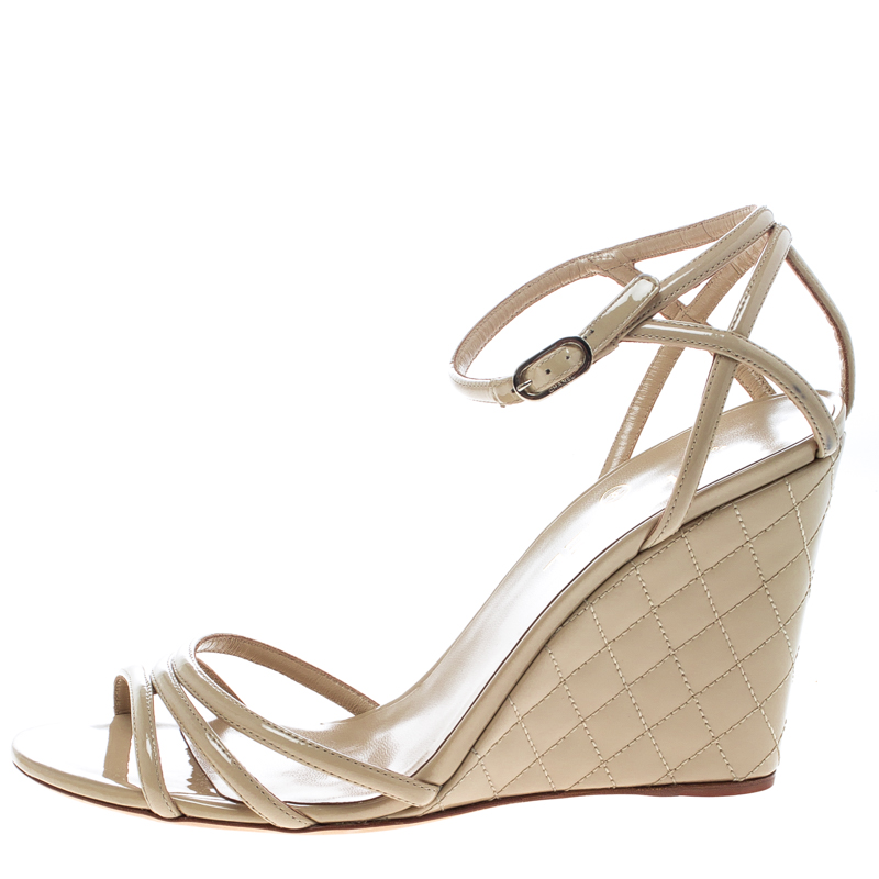 

Chanel Beige Patent Leather Ankle Strap Quilted Wedge Open Toe Sandals Size