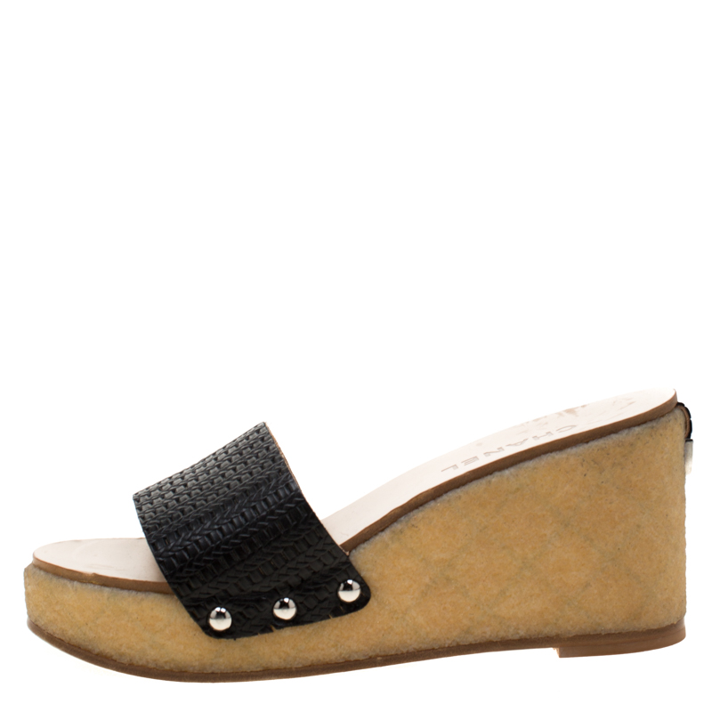 

Chanel Black Woven Leather Wedge Slides Size