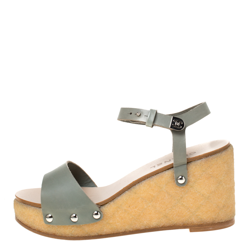 

Chanel Grey Leather Ankle Strap Platform Wedge Sandals Size