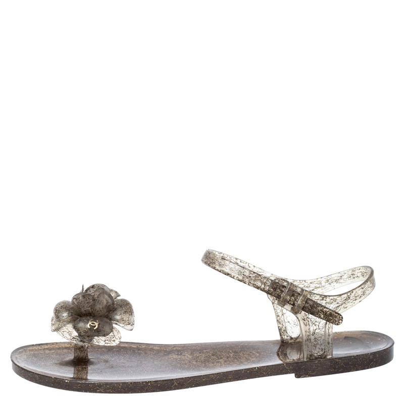 

Chanel Grey Glitter Jelly Camellia Flat Sandals Size