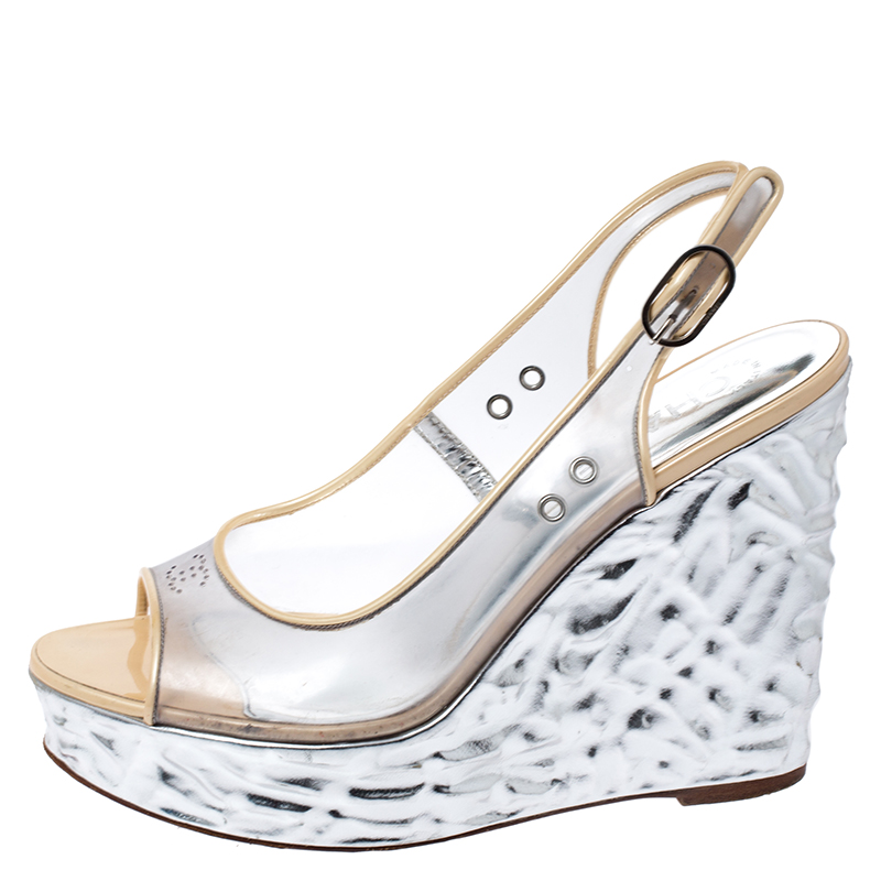 

Chanel PVC Metallic Silver Textured Wedge Heel Peep Toe Slingback Sandals Size