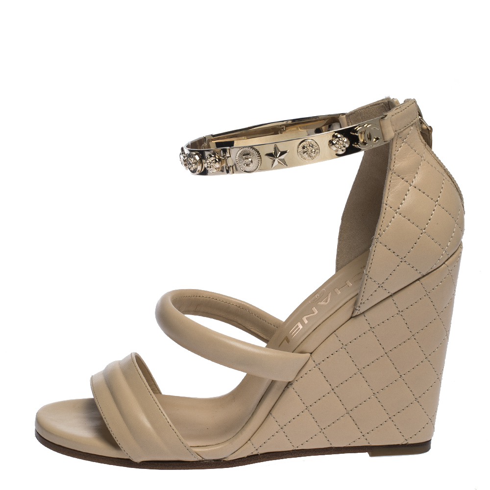 

Chanel Beige Quilted Leather Charm Embellished Ankle Cuff Wedge Sandals Size