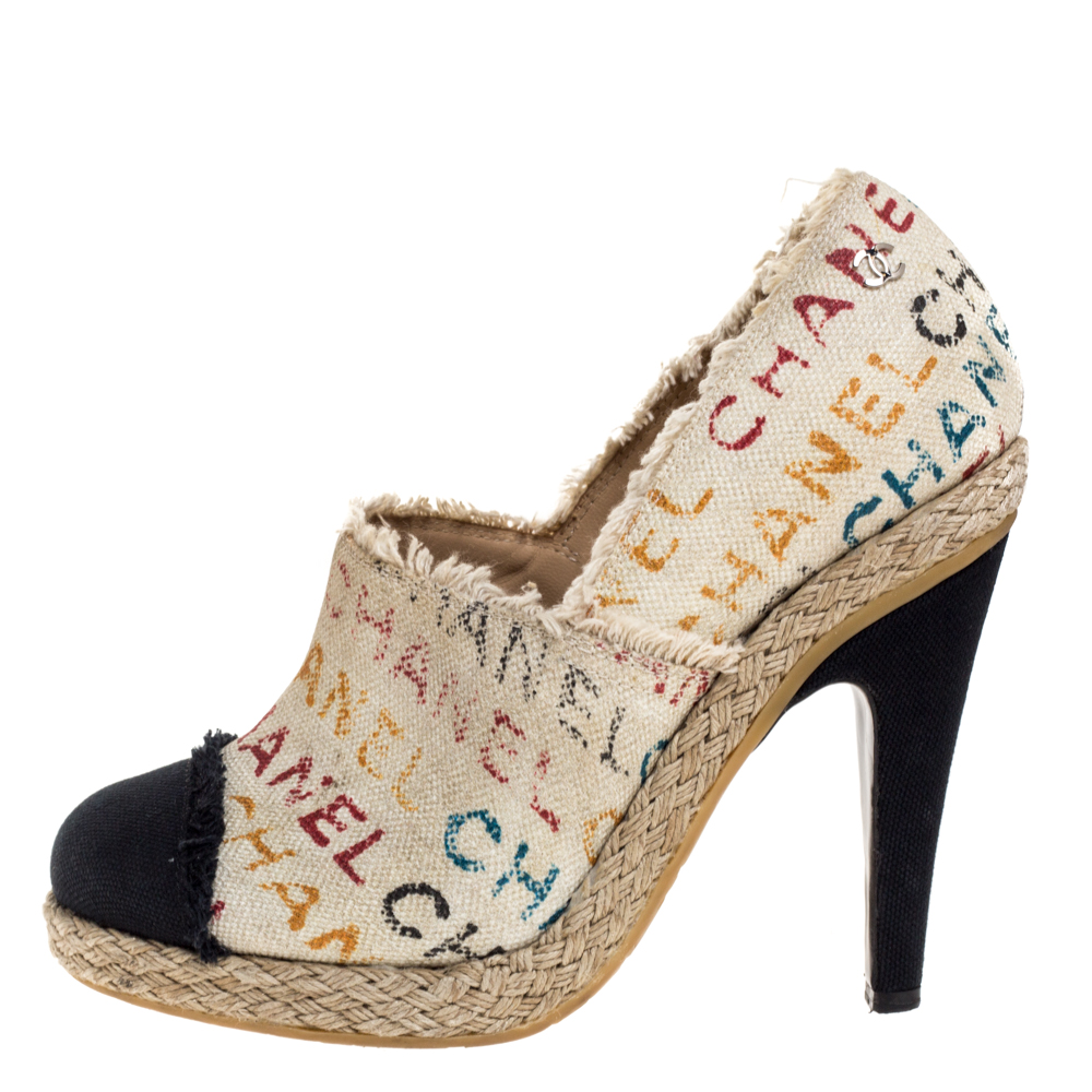 

Chanel White Logo Printed Canvas And Black Cap Toe Espadrilles Clogs Size