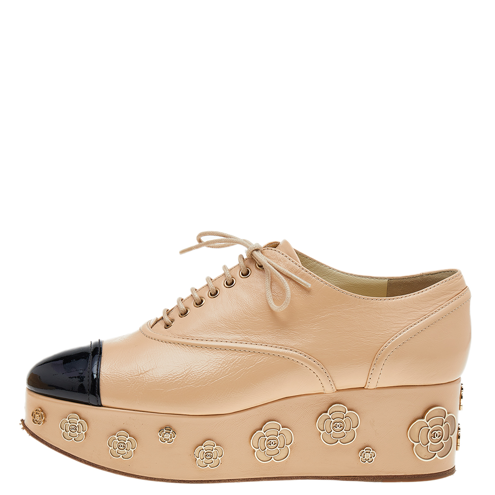 

Chanel Beige-Black Patent And Leather Camellia Platform Sneakers Size