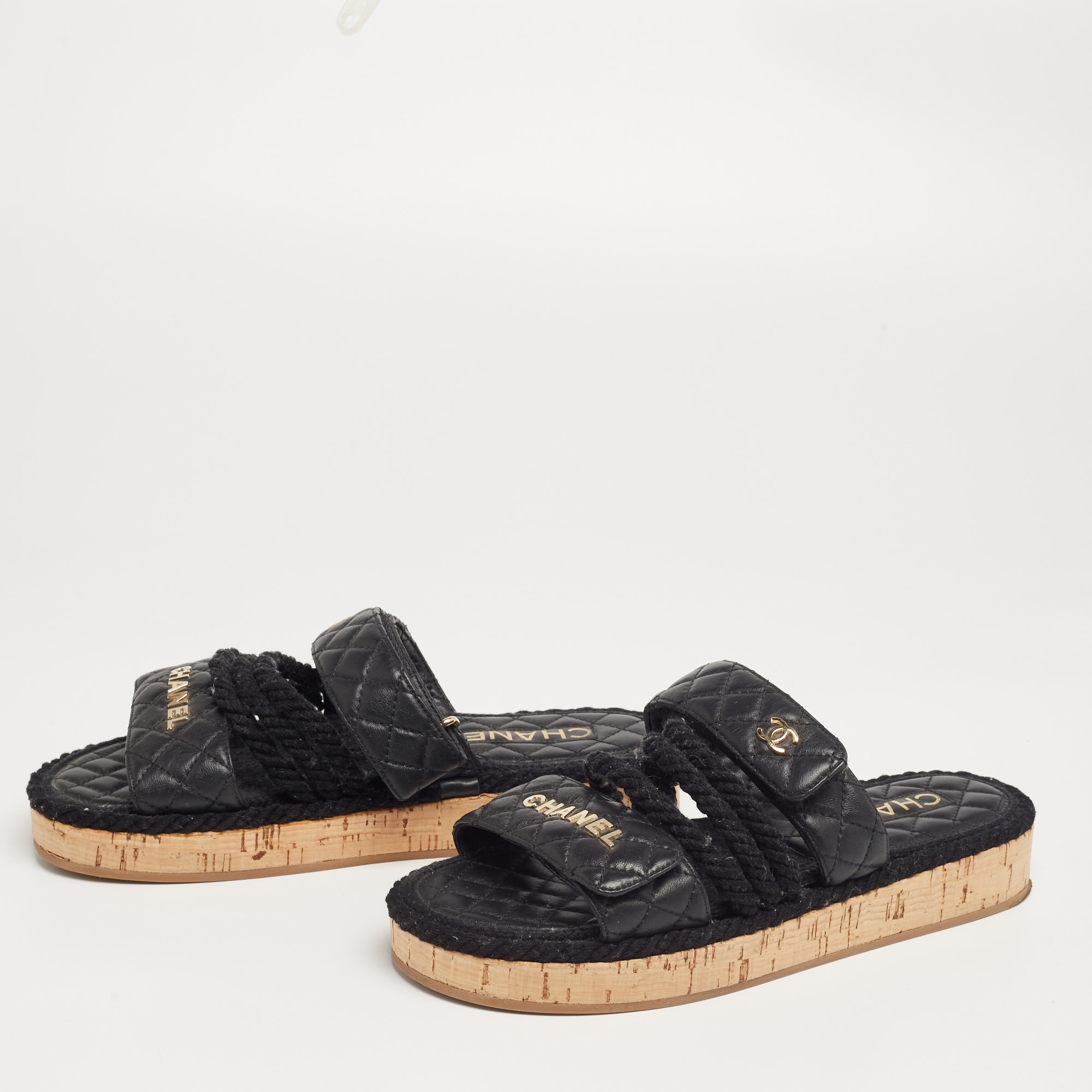 

Chanel Black Leather Quilted Rope CC Flat Sandals Size