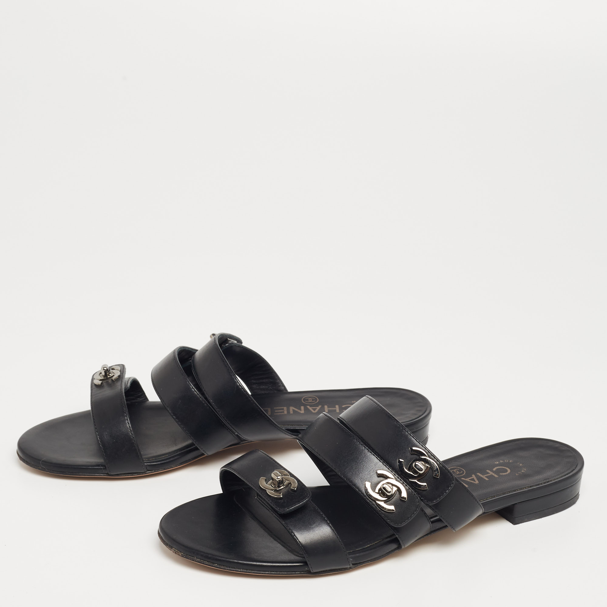 

Chanel Black Leather CC Turn-Lock Triple Strap Flat Slides Size