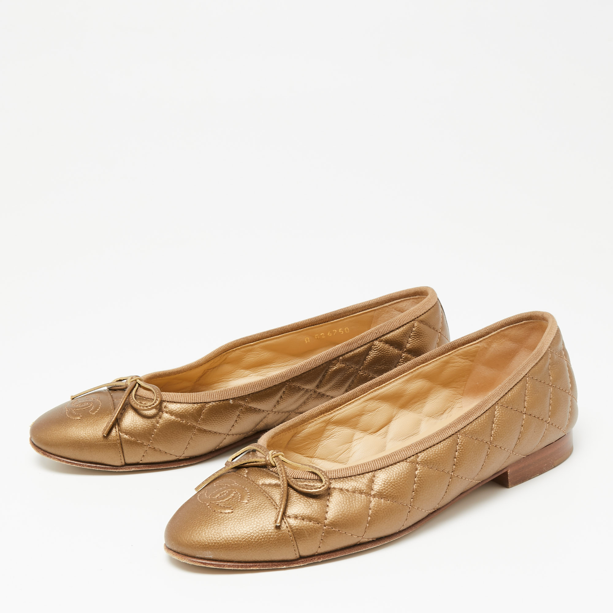 

Chanel Gold Leather Bow CC Cap Toe Ballet Flats Size