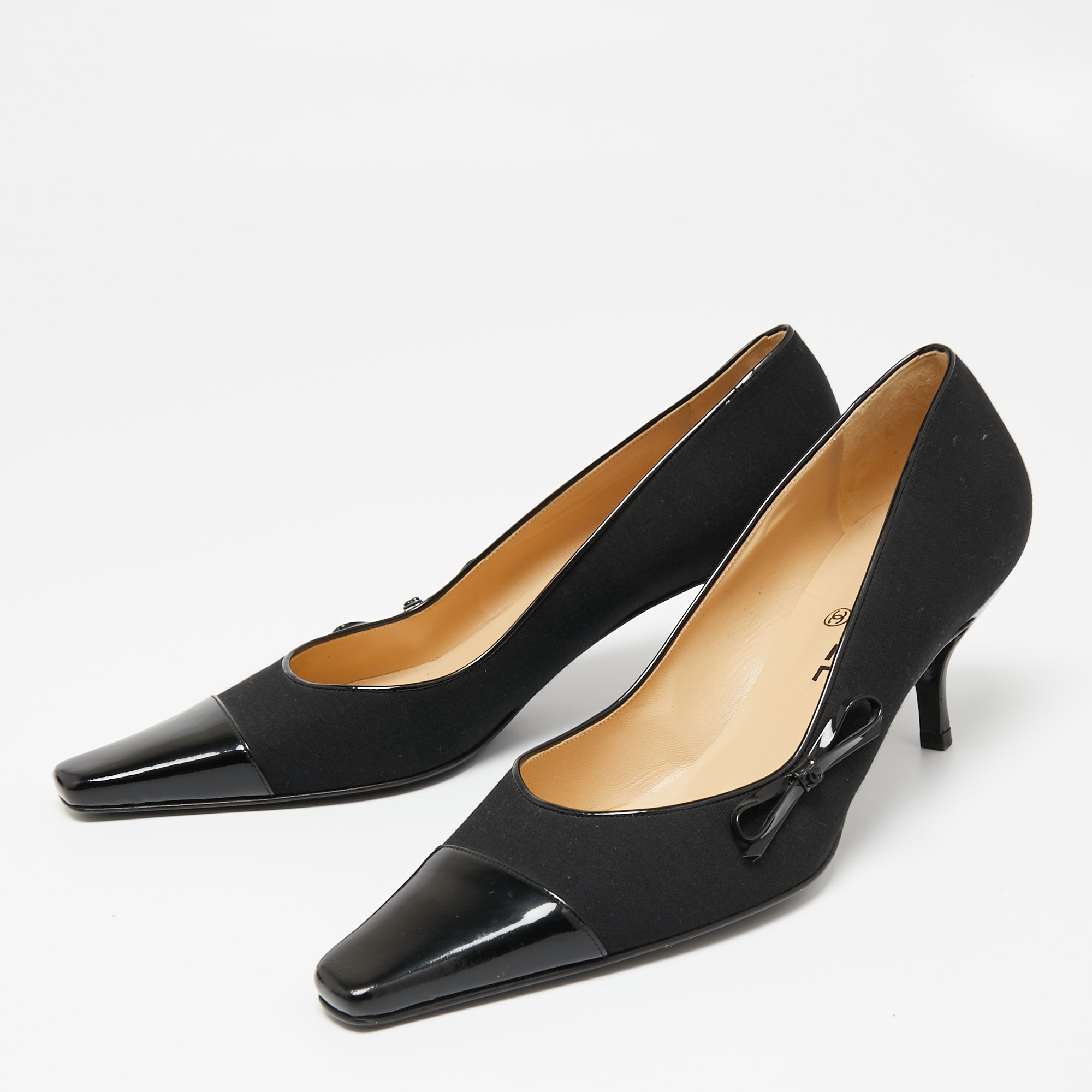

Chanel Black Canvas and Patent Leather Square Cap-Toe Bow Pumps Size