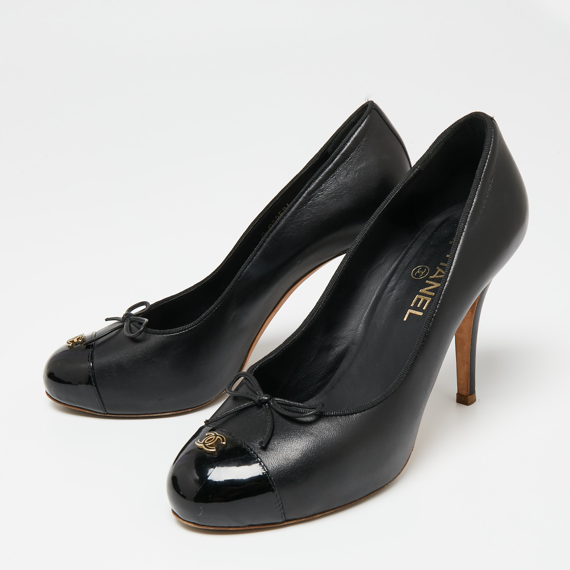 

Chanel Black Leather And Patent CC Cap Toe Pumps Size