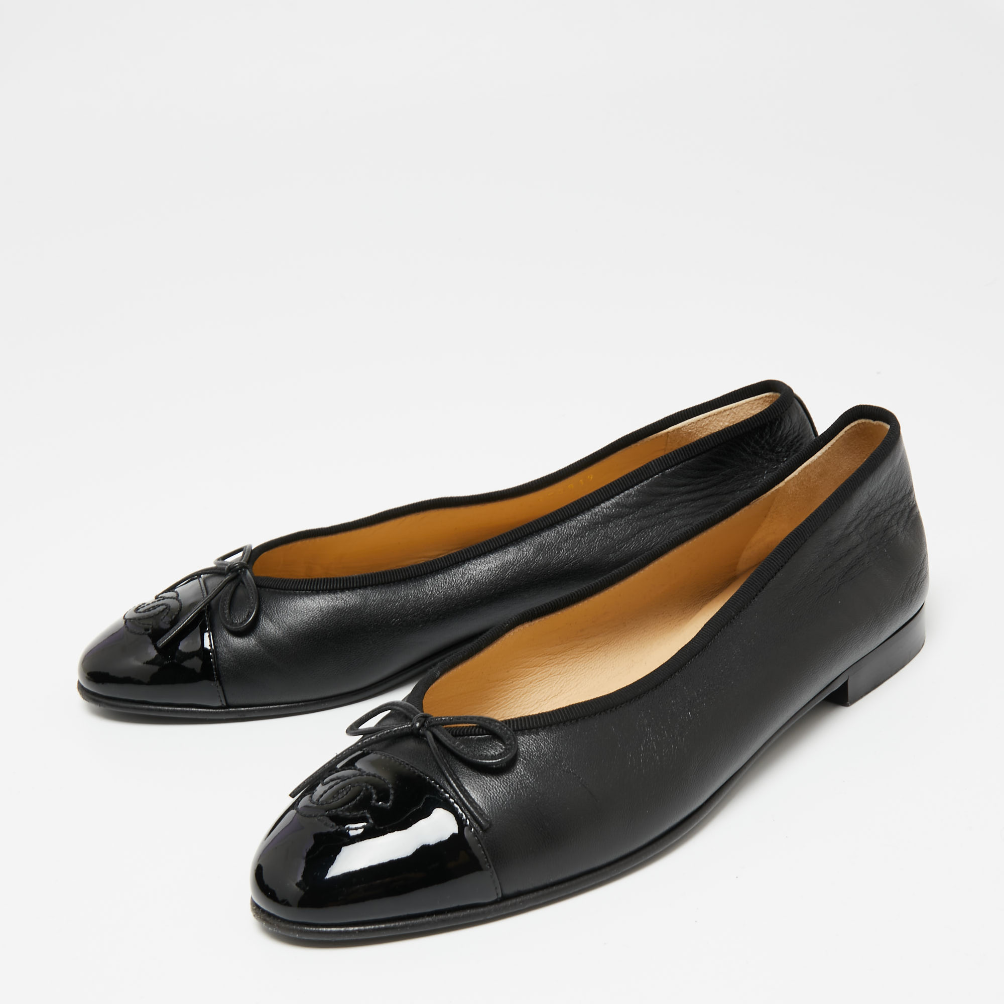 

Chanel Black Leather and Patent CC Cap-Toe Bow Ballet Flats Size