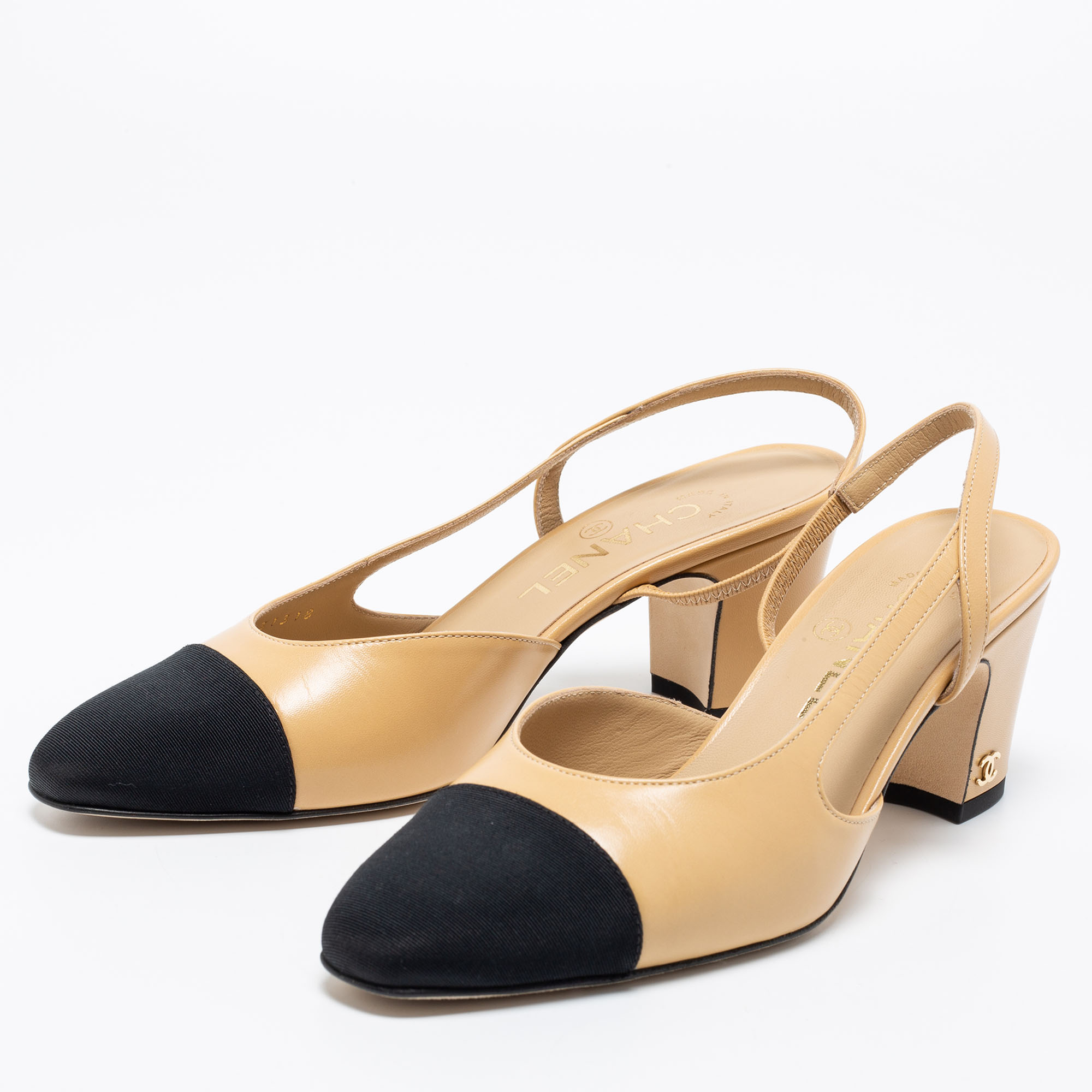 

Chanel Beige/Black Leather And Fabric Cap Toe Slingback Sandals Size