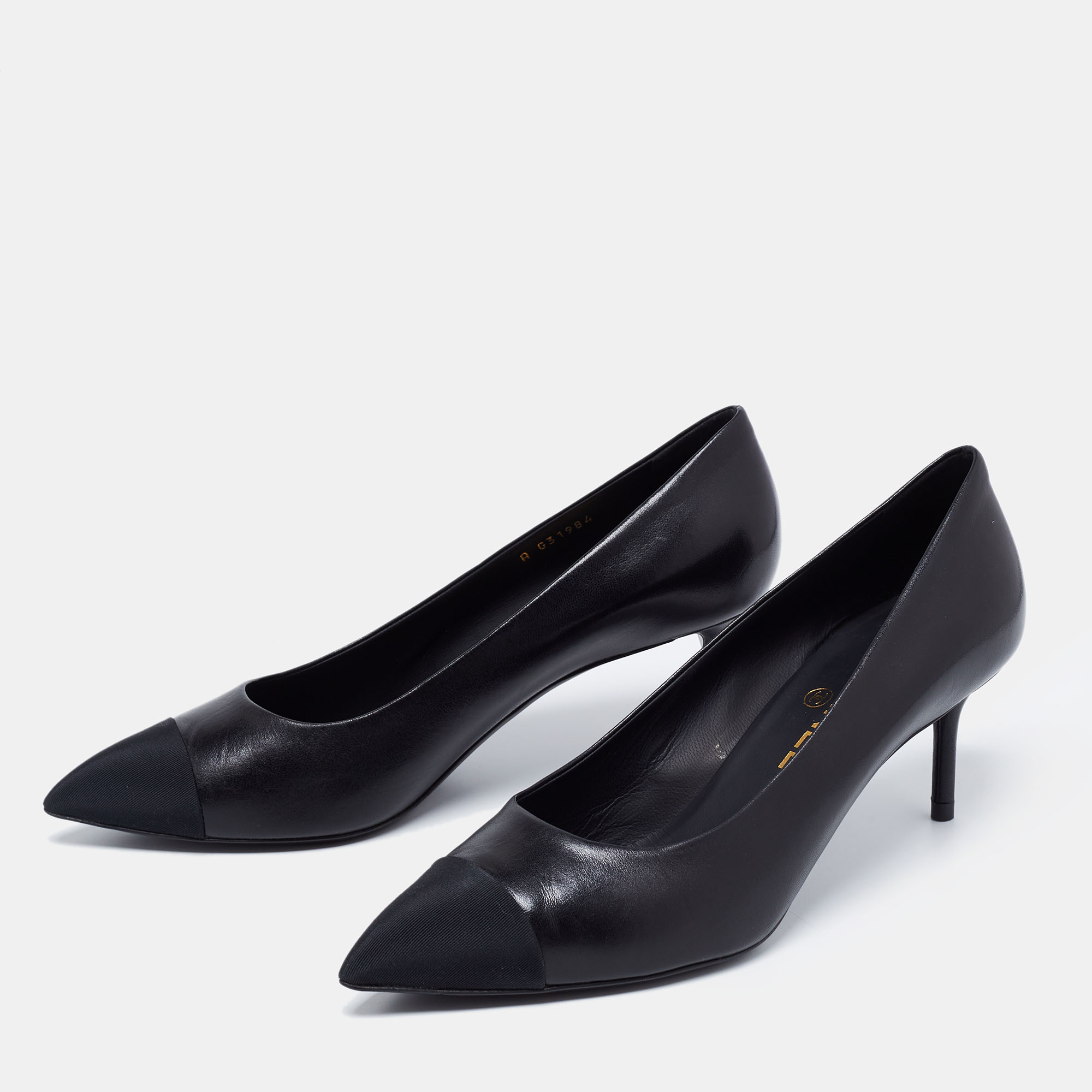 

Chanel Black Leather And Fabric CC Cap Toe Pumps Size