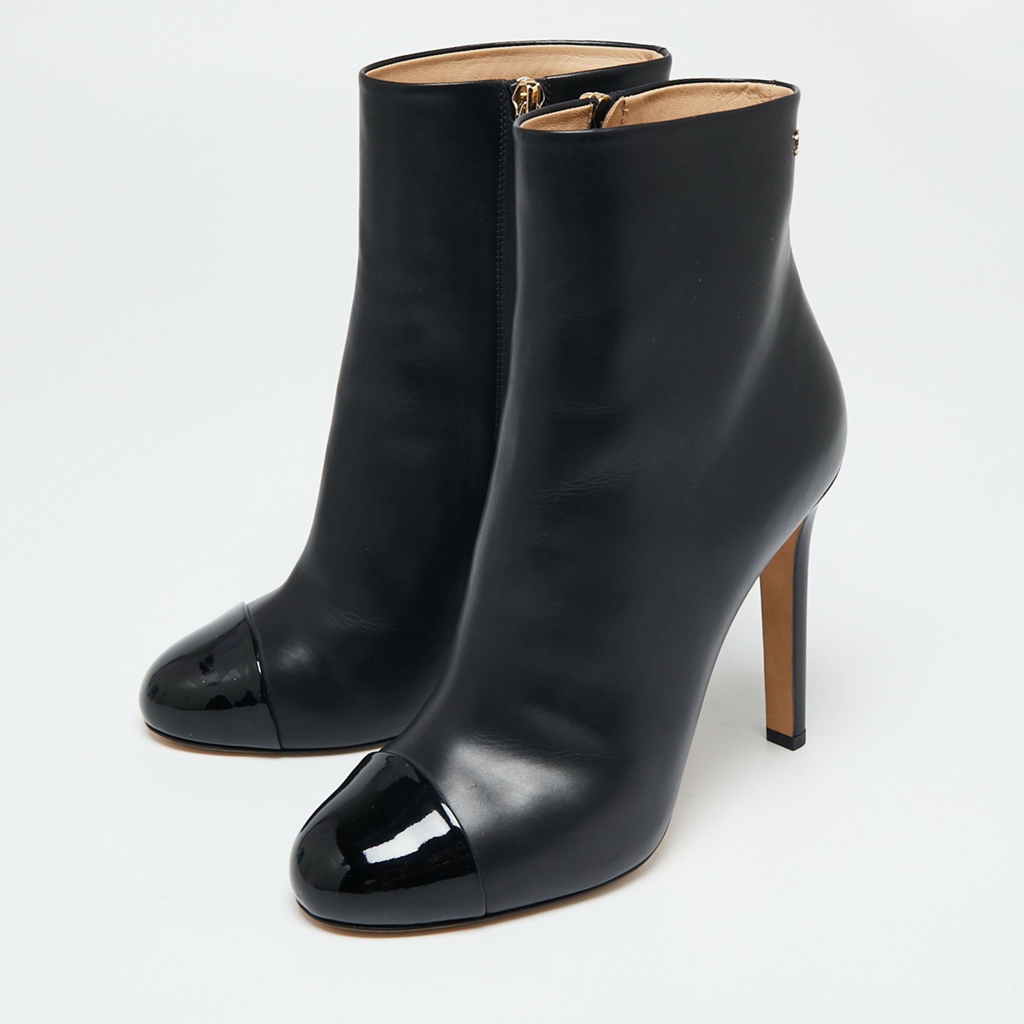 

Chanel Black Patent And Leather Cap Toe Ankle Length Boots Size