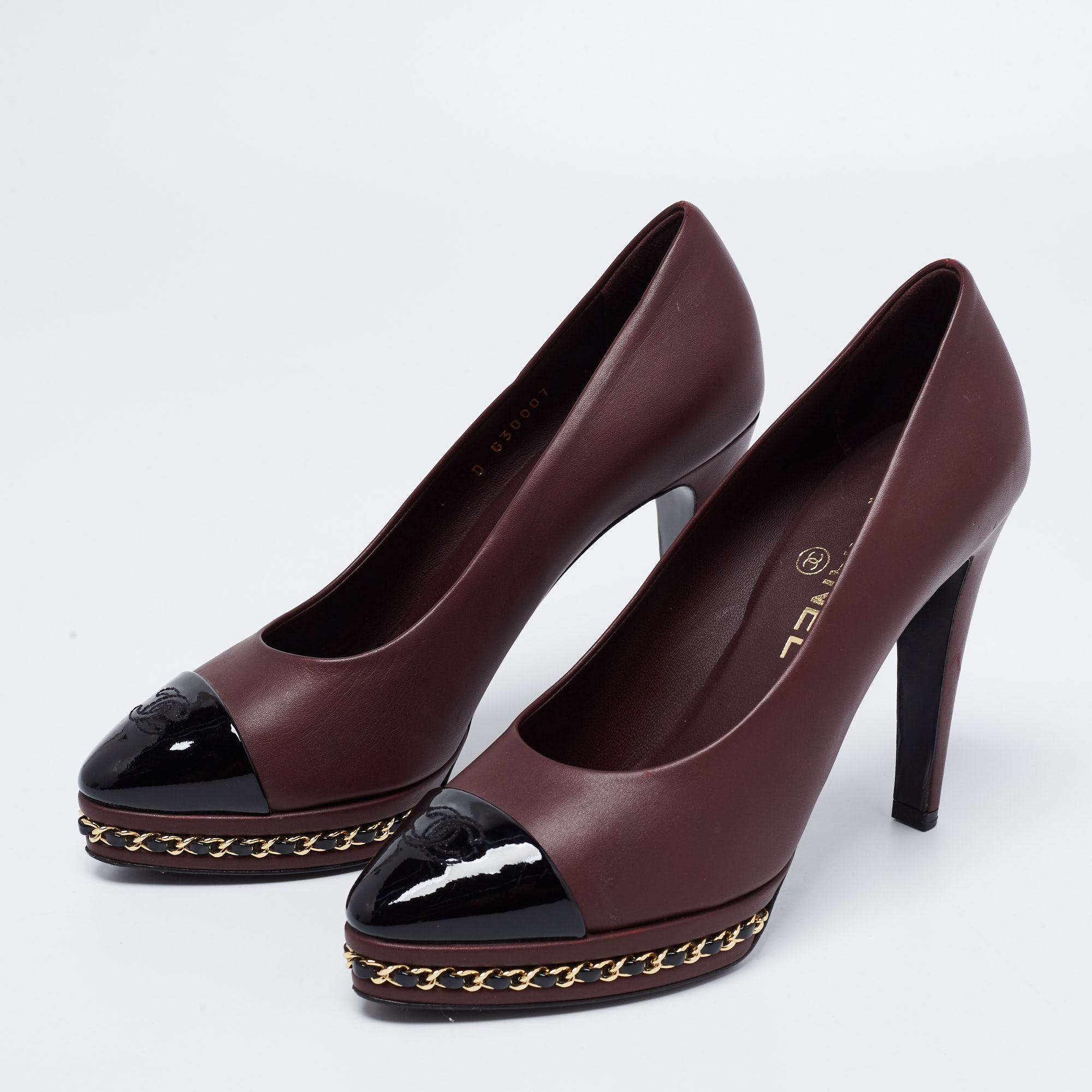 

Chanel Burgundy/Black Leather and Patent CC Cap Toe Chain Platform Pumps Size