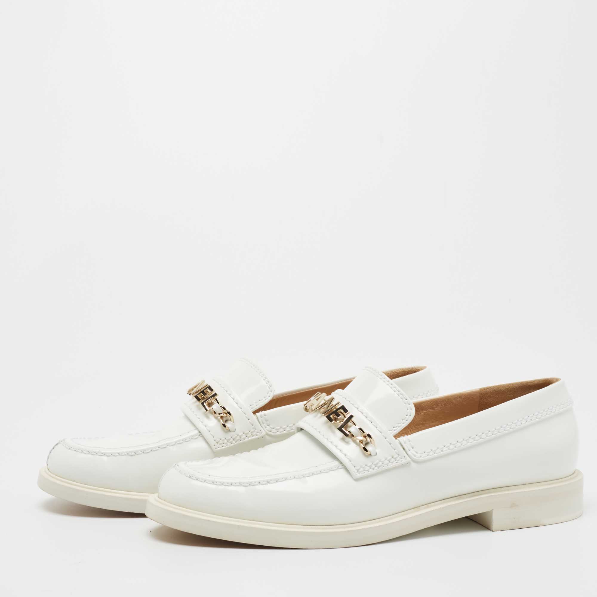 

Chanel White Leather Logo Chain Slip On Loafers Size