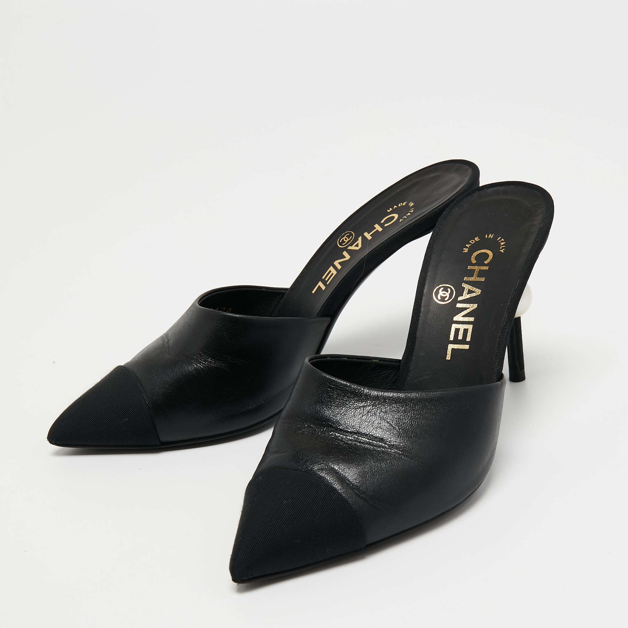 

Chanel Black Leather and Fabric CC Cap Toe Embellished Mules Size