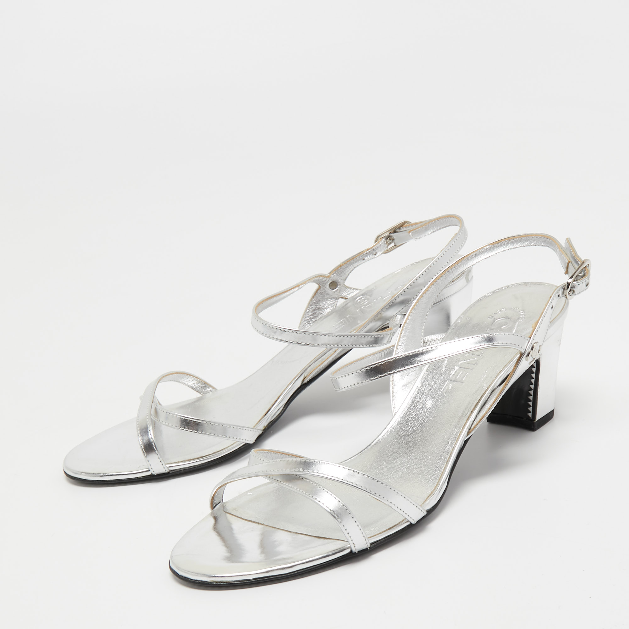 

Chanel Silver Leather Ankle Strap Sandals Size