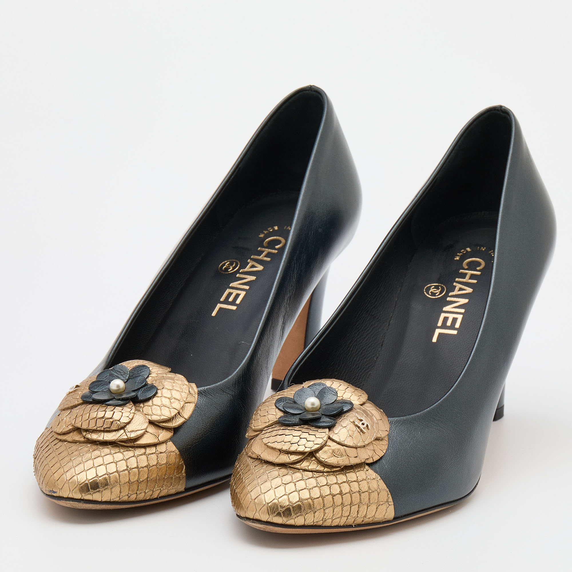 

Chanel Black/Gold Leather and Python Camellia Cap Toe Pumps Size