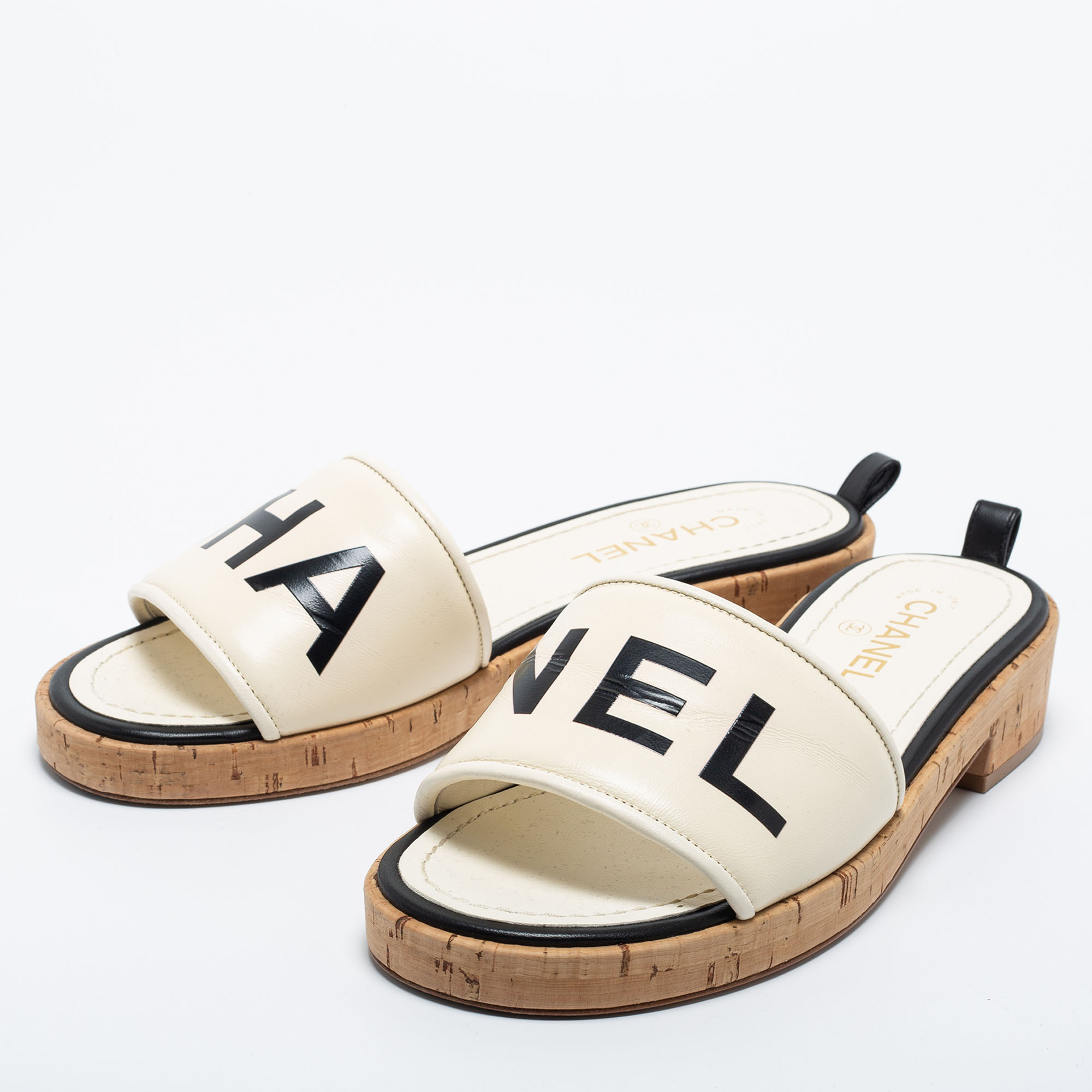 

Chanel Cream Logo Leather Cork Slide Sandals Size