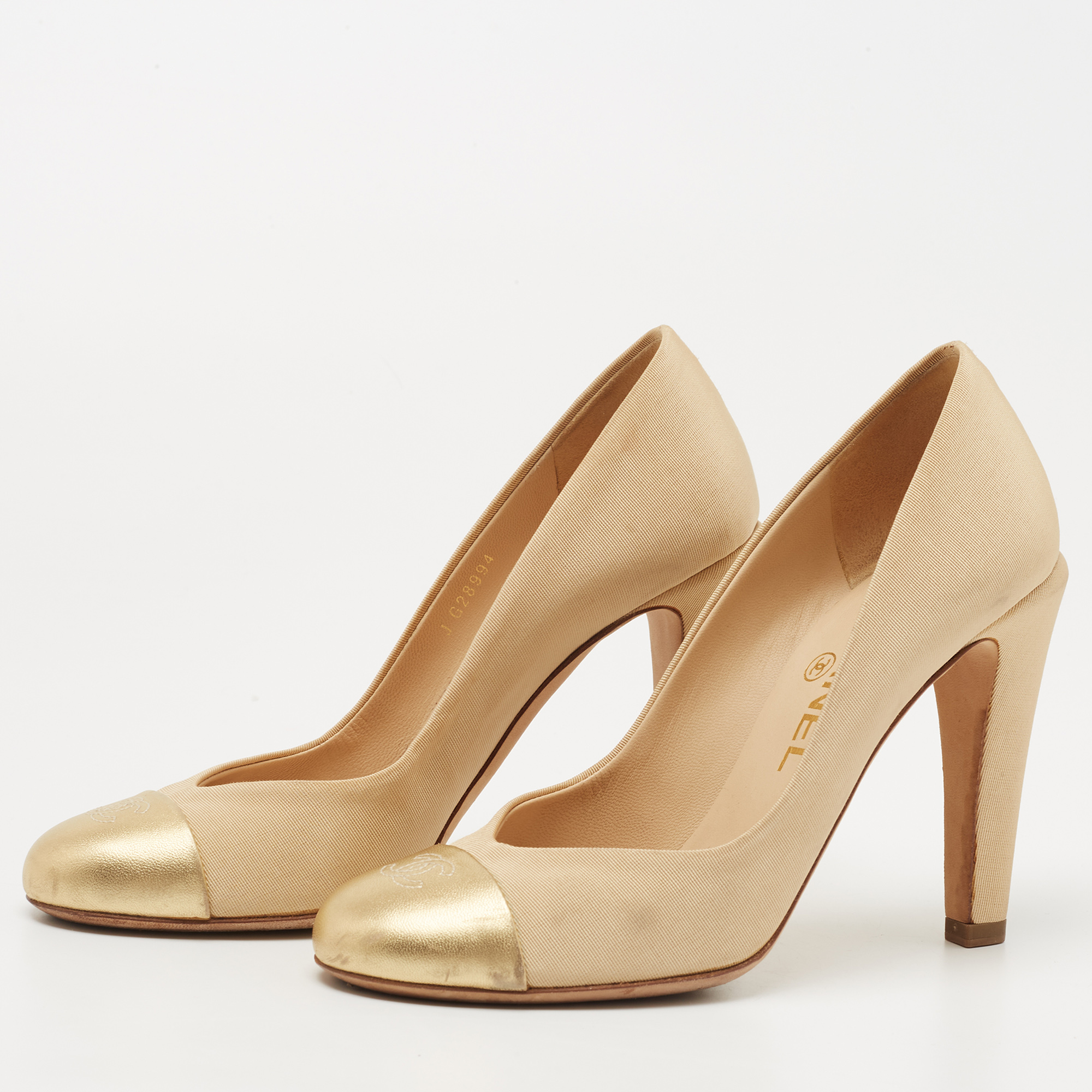 

Chanel Gold/Beige Canvas and Leather CC Cap Toe Pumps Size
