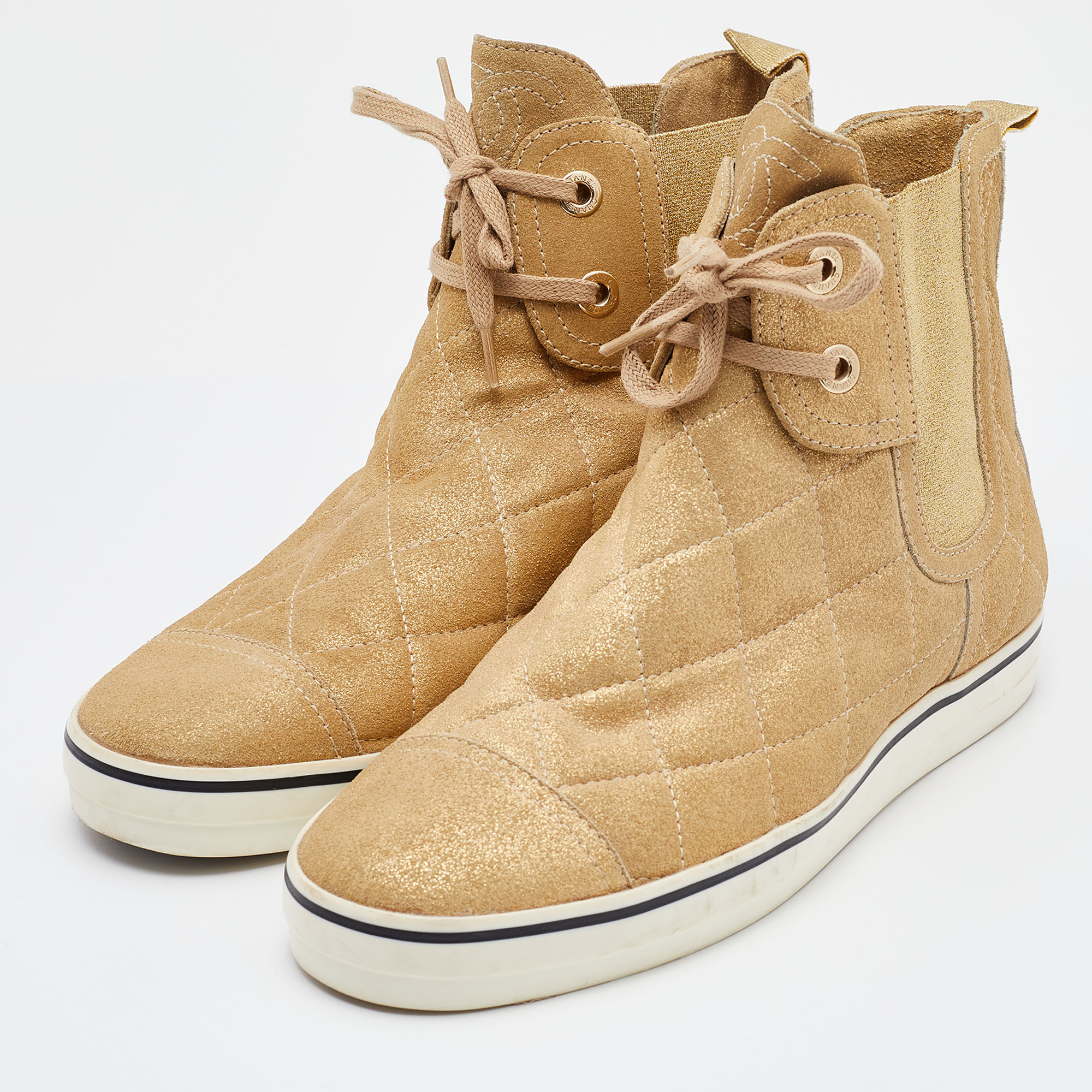 

Chanel Metallic Gold Leather CC High Top Sneakers Size