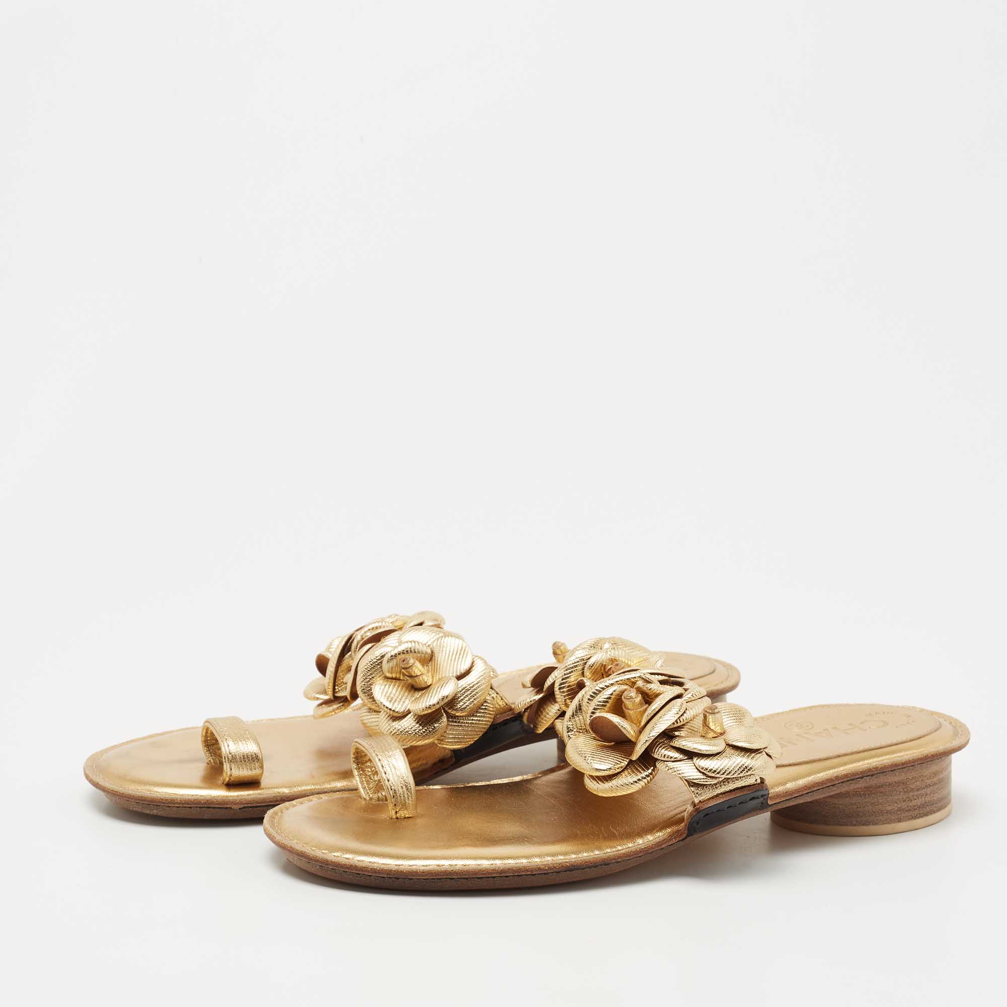 

Chanel Gold Leather Camellia Toe Ring Sandals Size