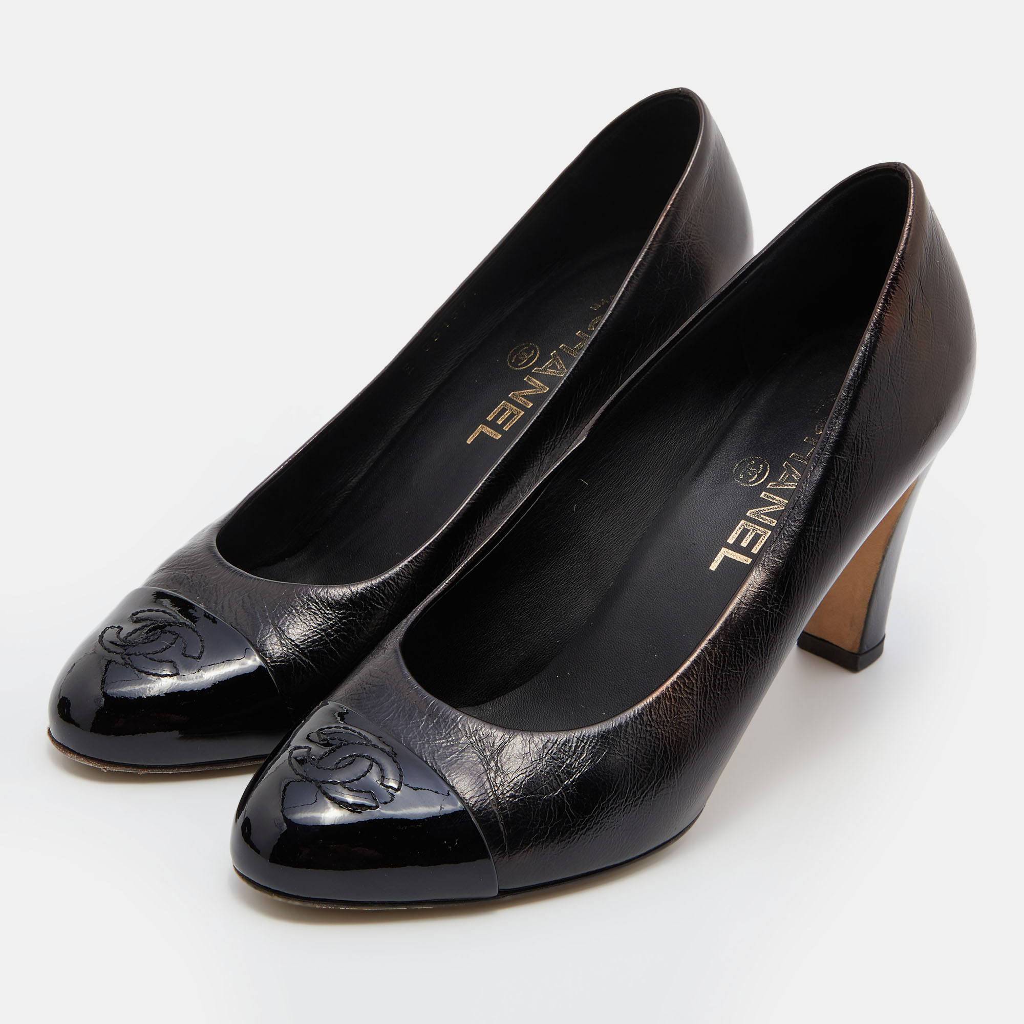 

Chanel Black Leather and Patent CC Cap Toe Pumps Size