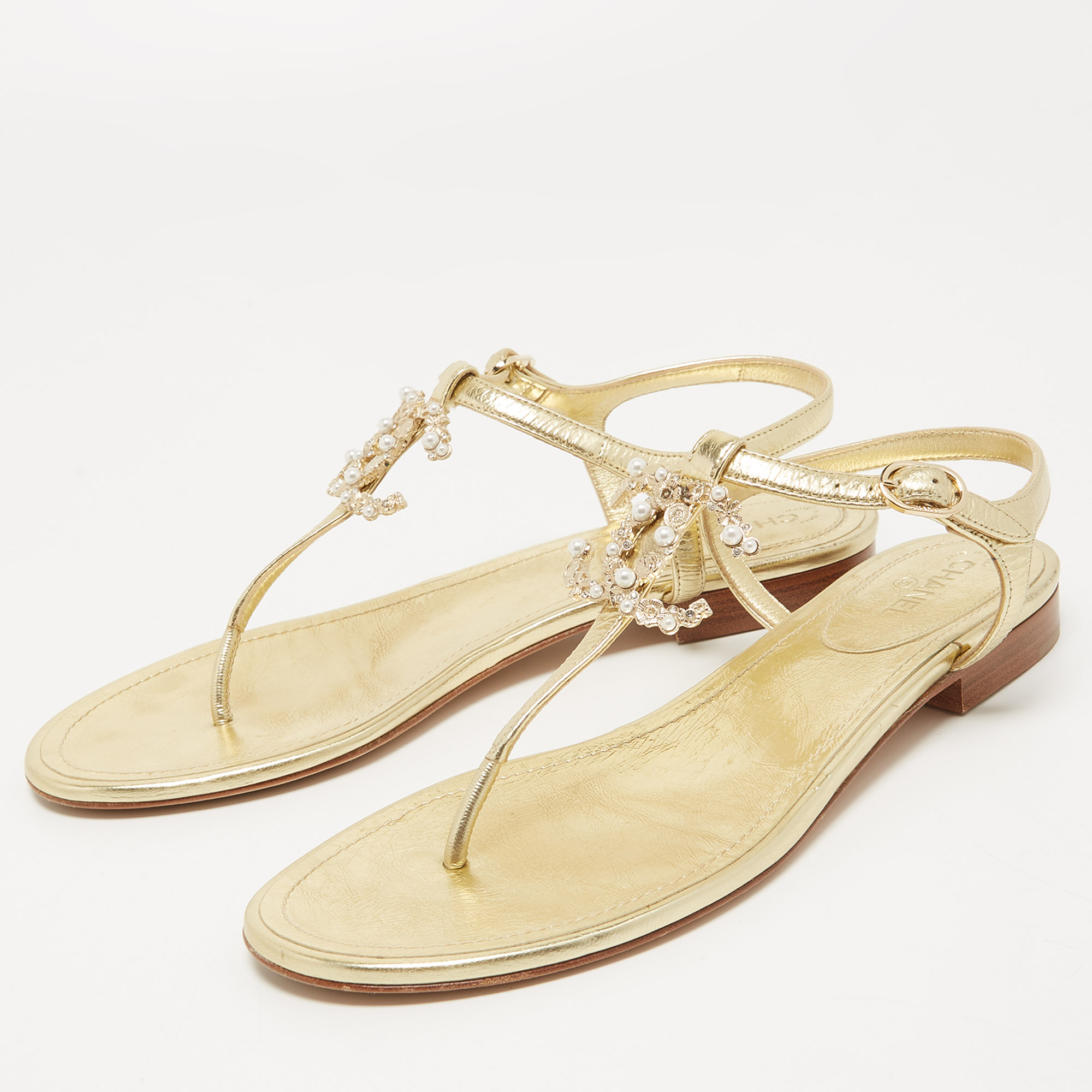 

Chanel Gold Leather Embellished CC T-Strap Flat Sandals Size