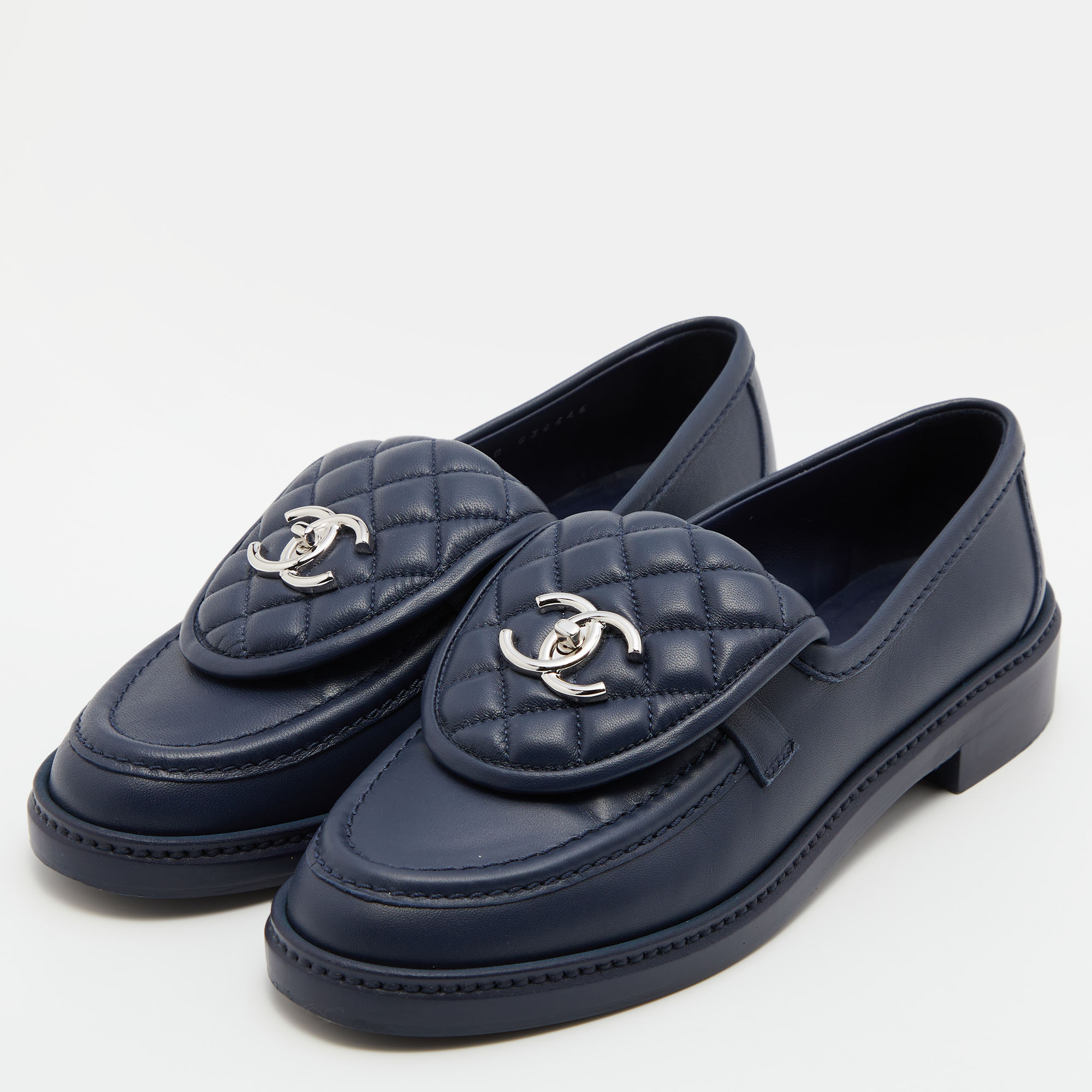 

Chanel Blue Quilted Leather CC Turnlock Loafers Size
