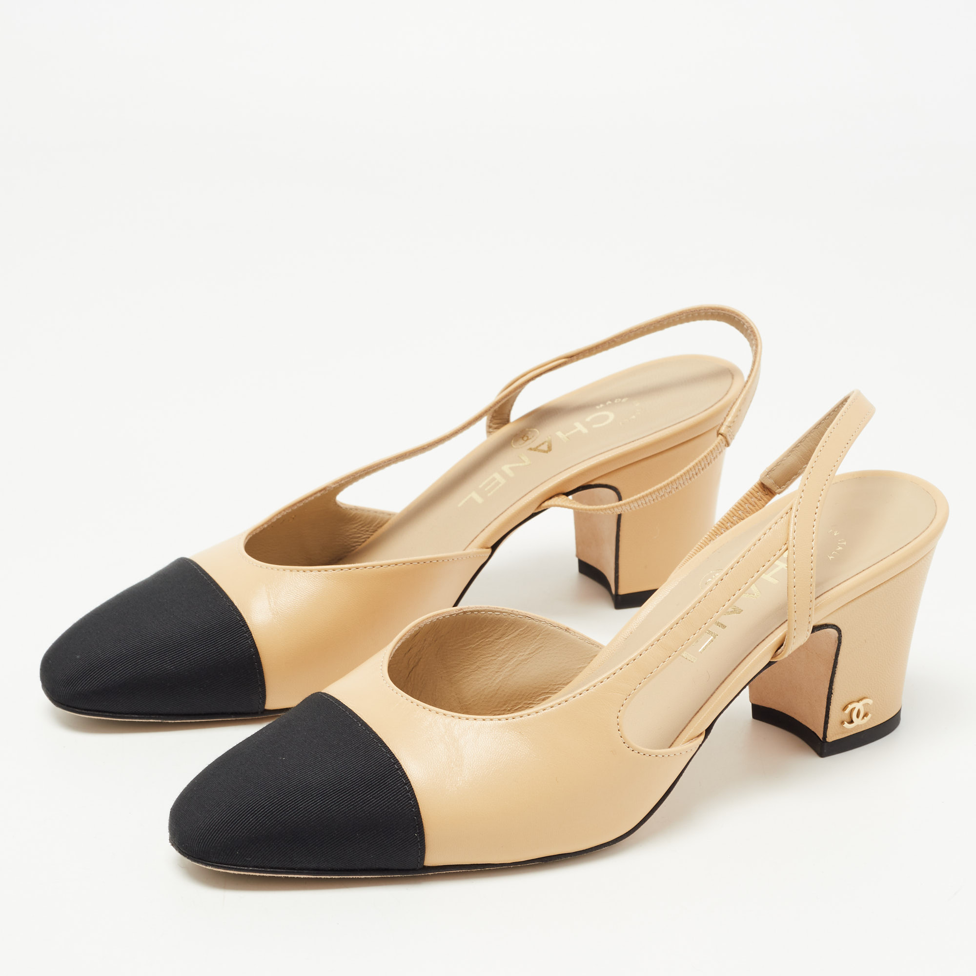 

Chanel Beige/Black Leather and Canvas CC Slingback Pumps Size