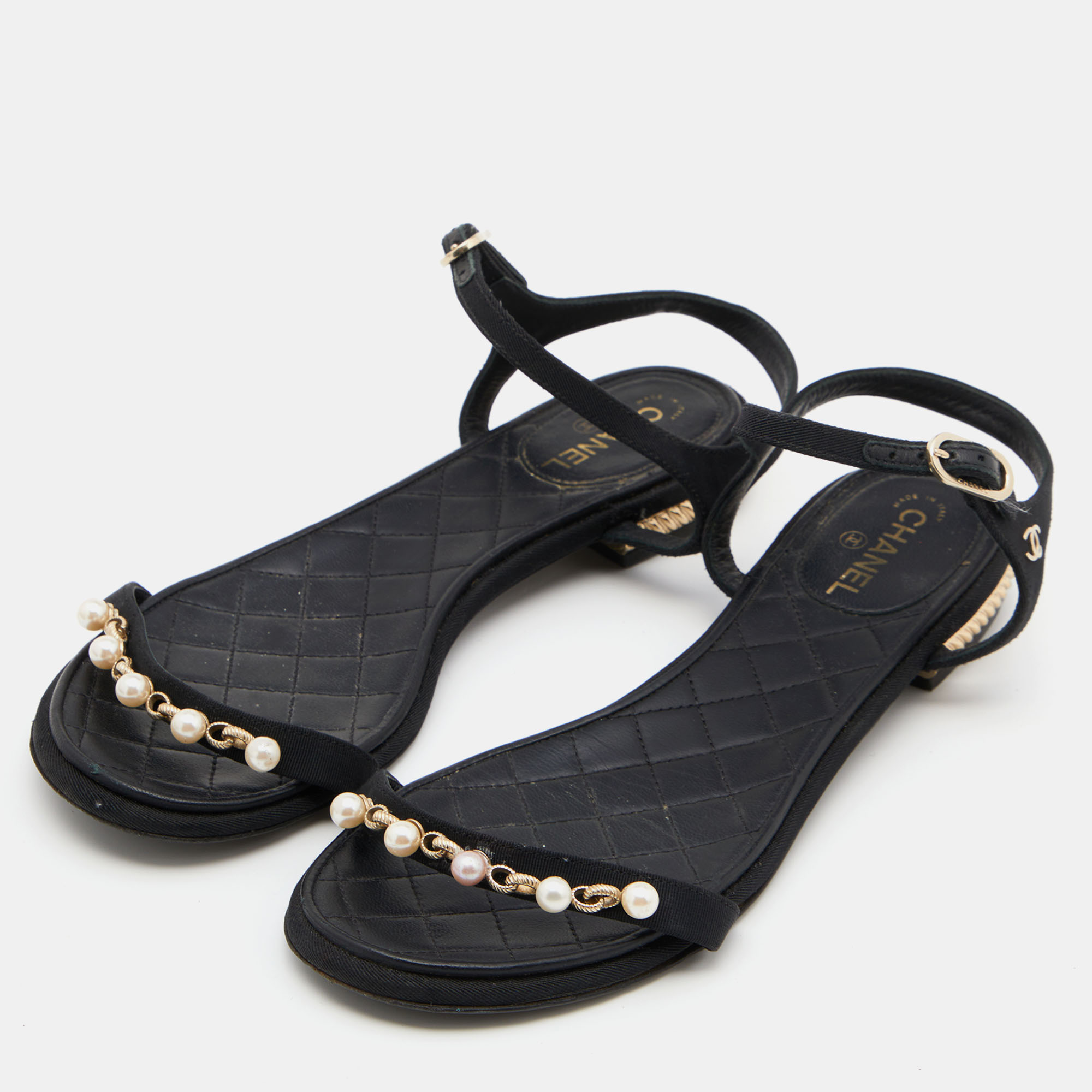 

Chanel Black Canvas Pearl Embellished Ankle Strap Flat Sandals Size