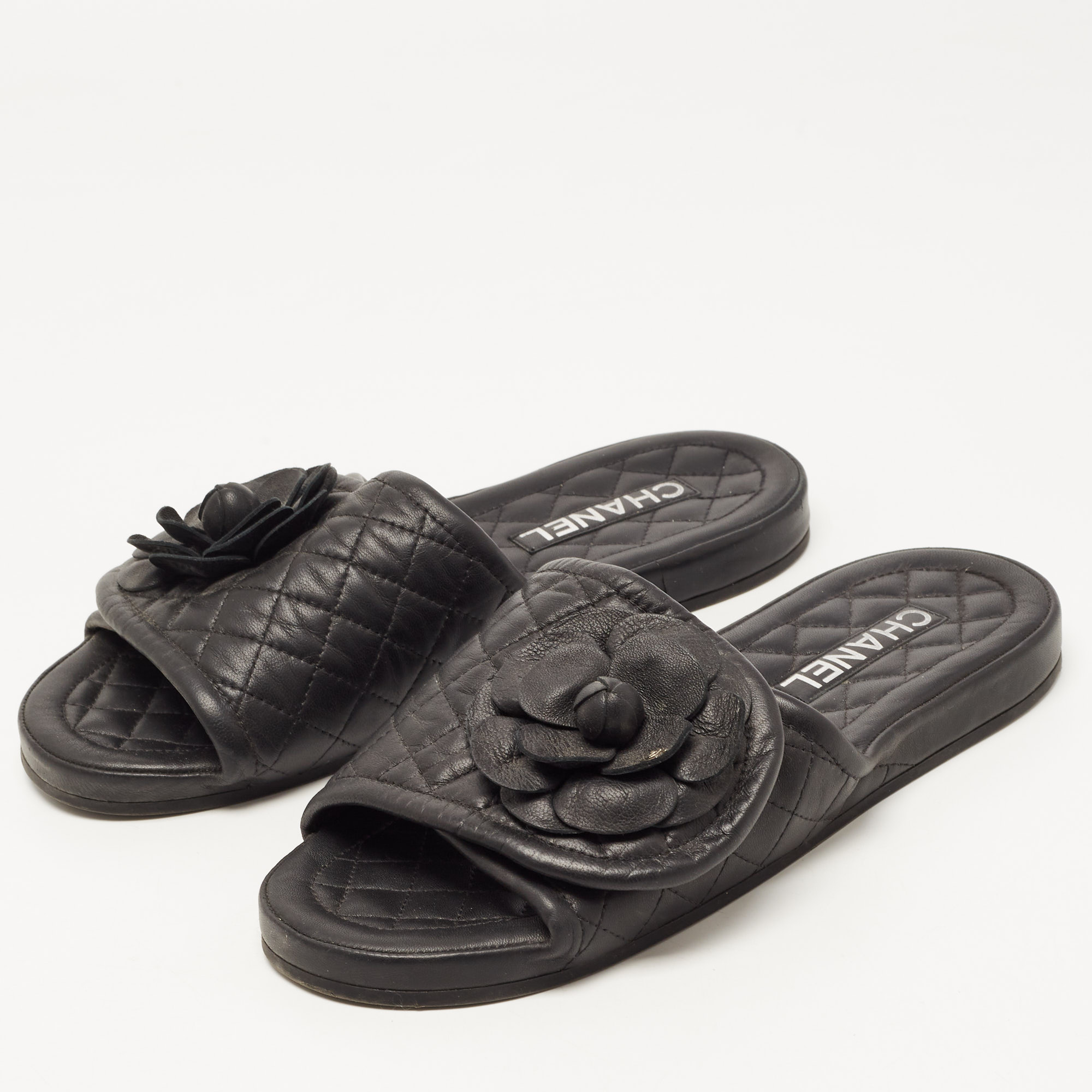 

Chanel Black Quilted Leather Camelia CC Flat Slides Size