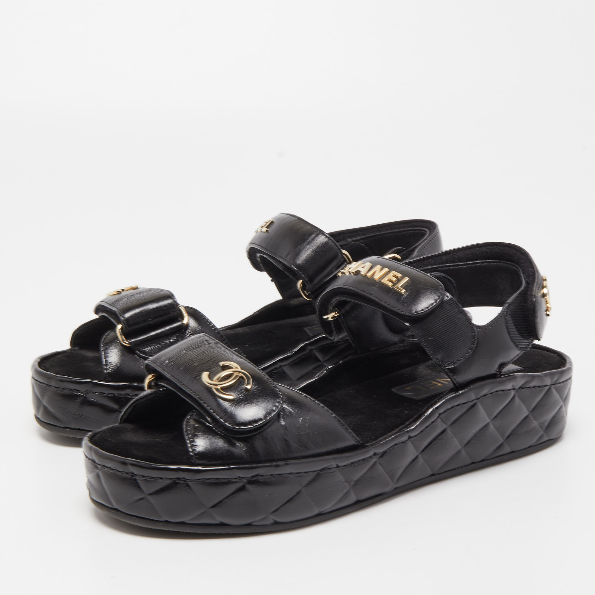 

Chanel Black Quilted Leather Interlocking CC Logo Flat Sandals Size
