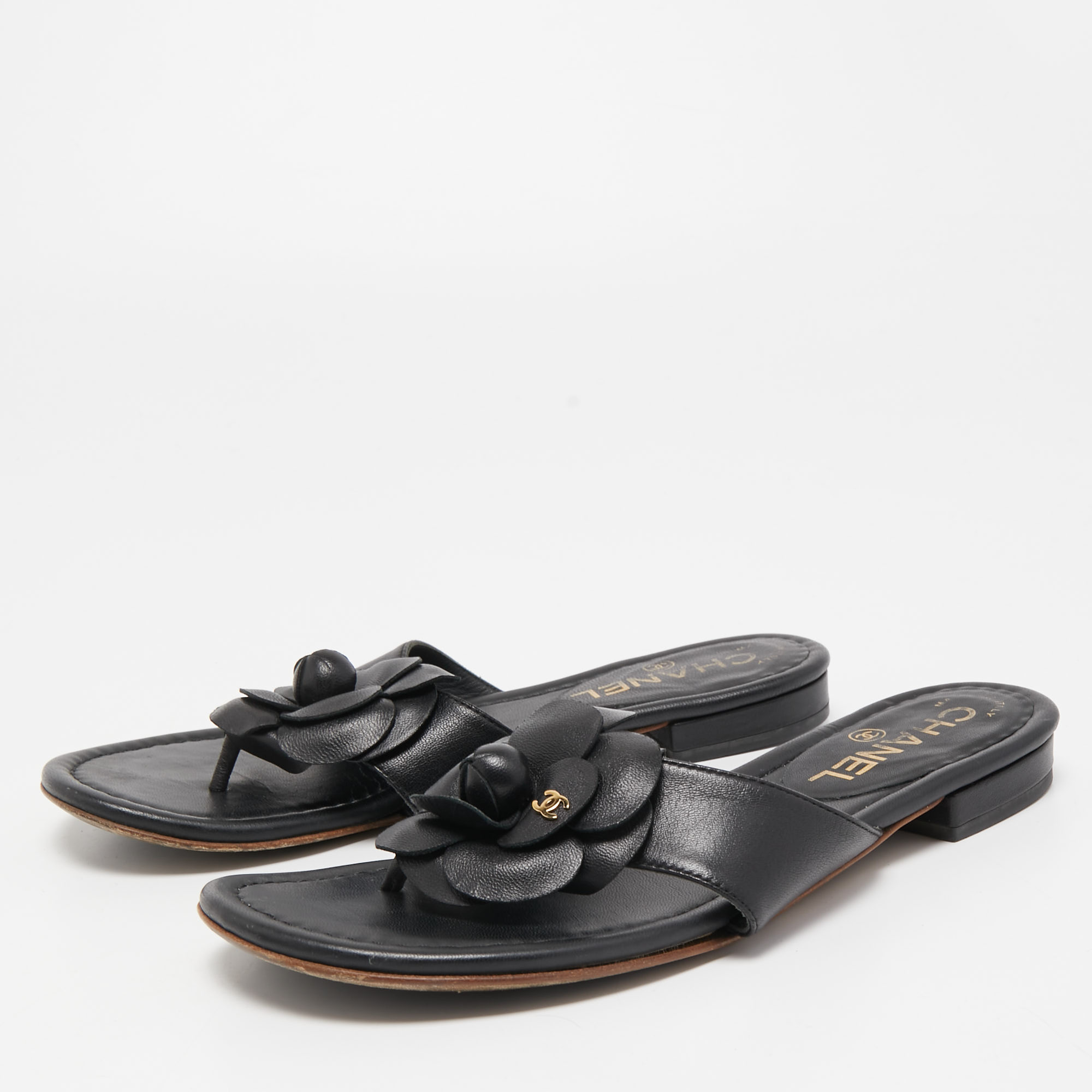 

Chanel Black Leather CC Camellia Flat Thong Sandals Size