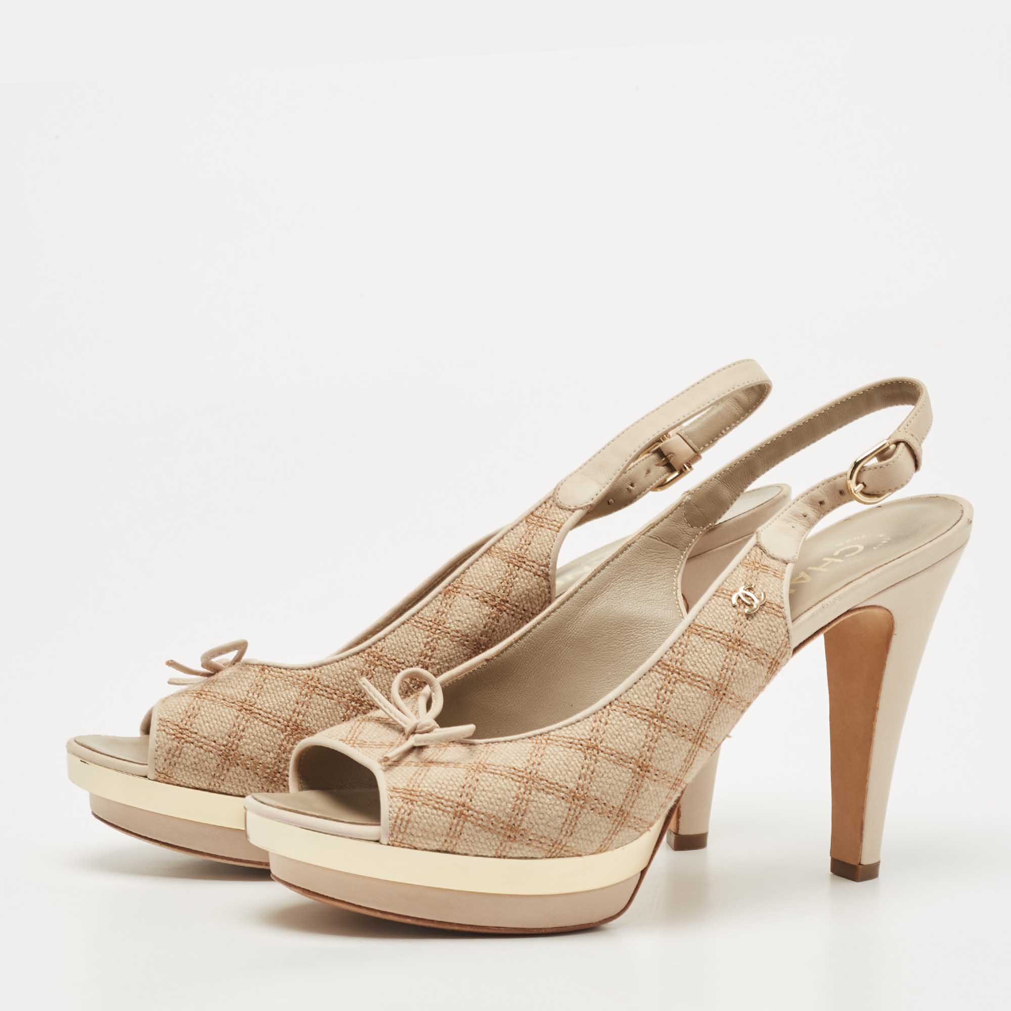 

Chanel Cream/Beige Canvas And Leather CC Bow Peep Toe Platform Slingback Sandals Size
