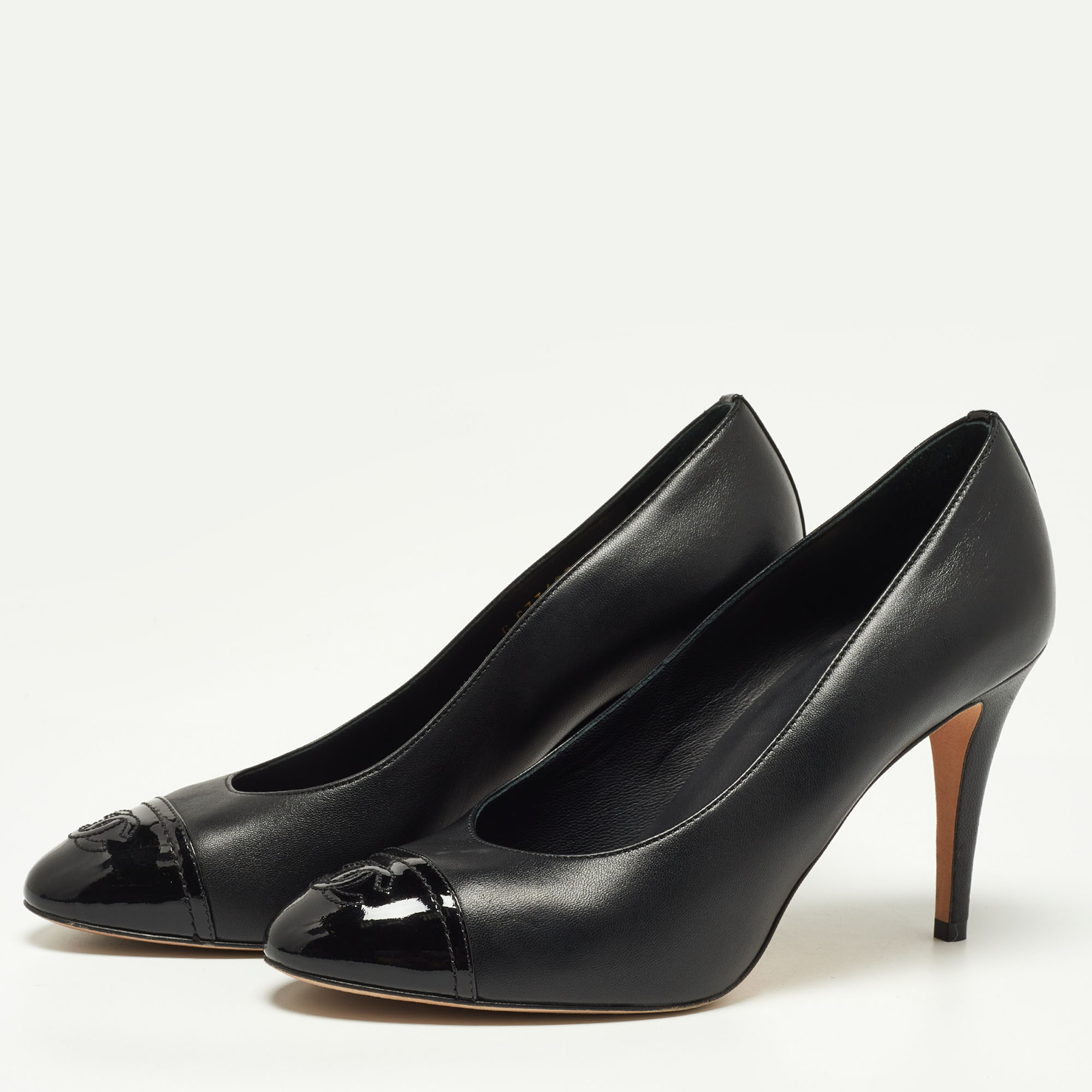 

Chanel Black Leather and Patent Leather CC Cap Pumps Size