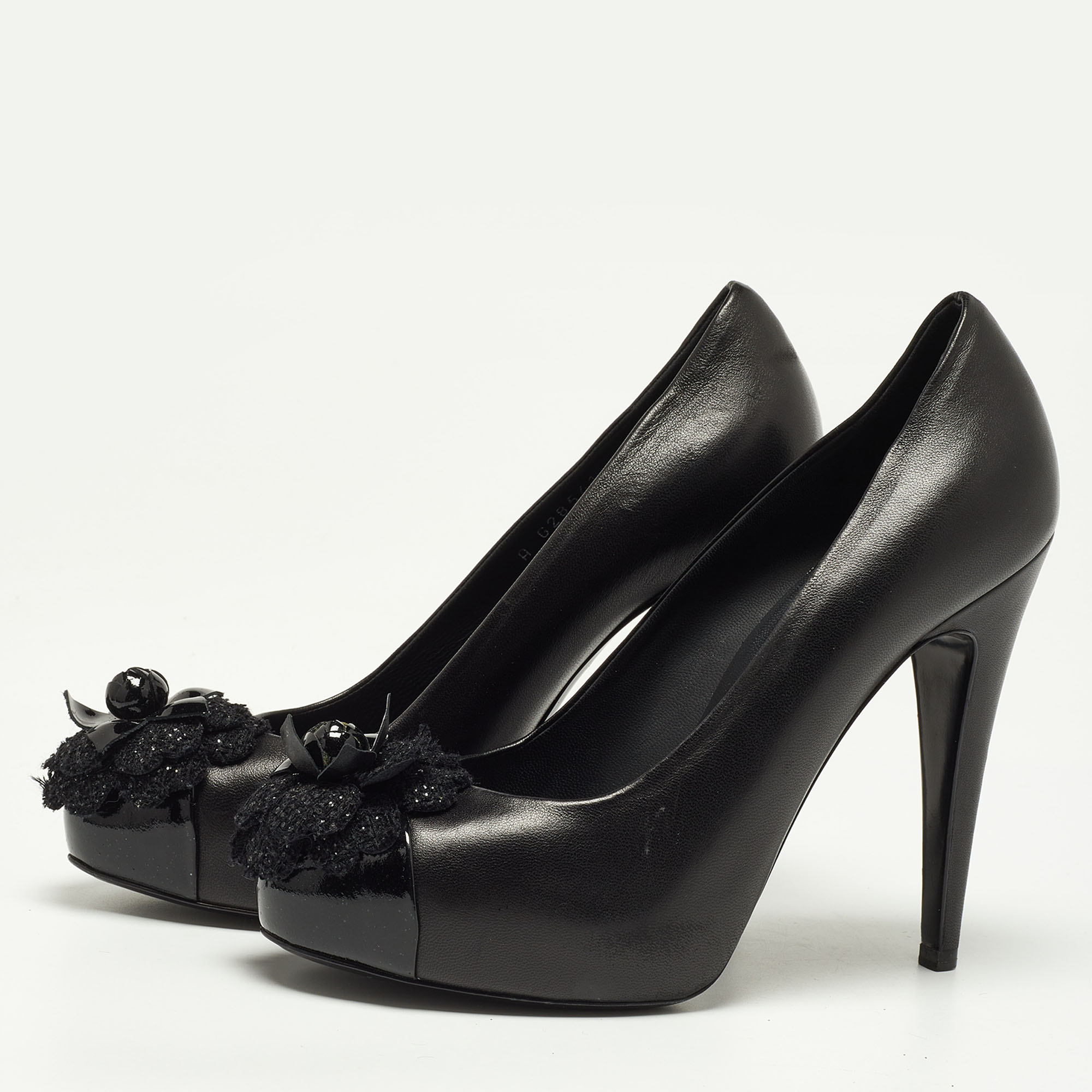 

Chanel Black Leather CC Camellia Cap Toe Pumps Size