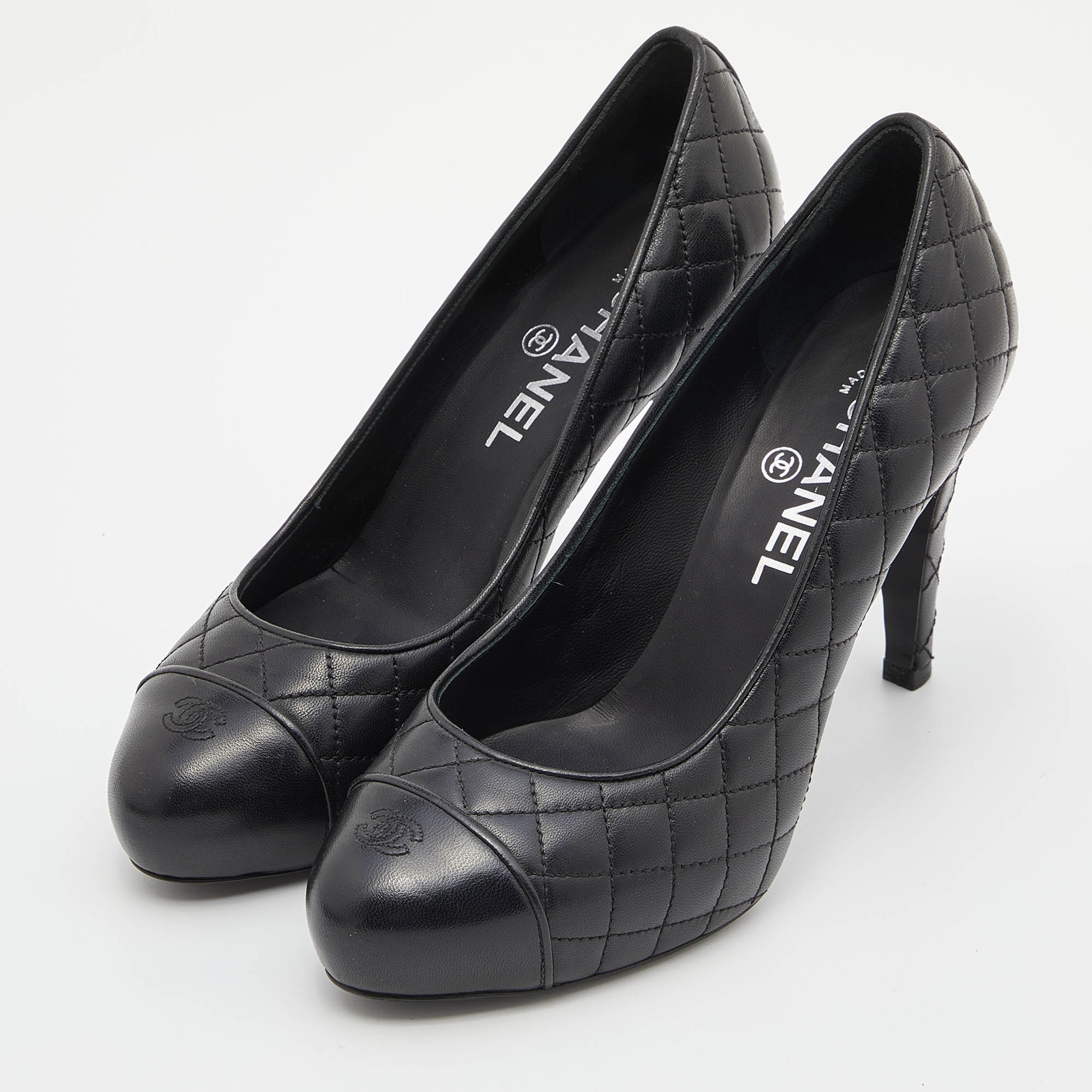 

Chanel Black Quilted Leather CC Cap Toe Pumps Size