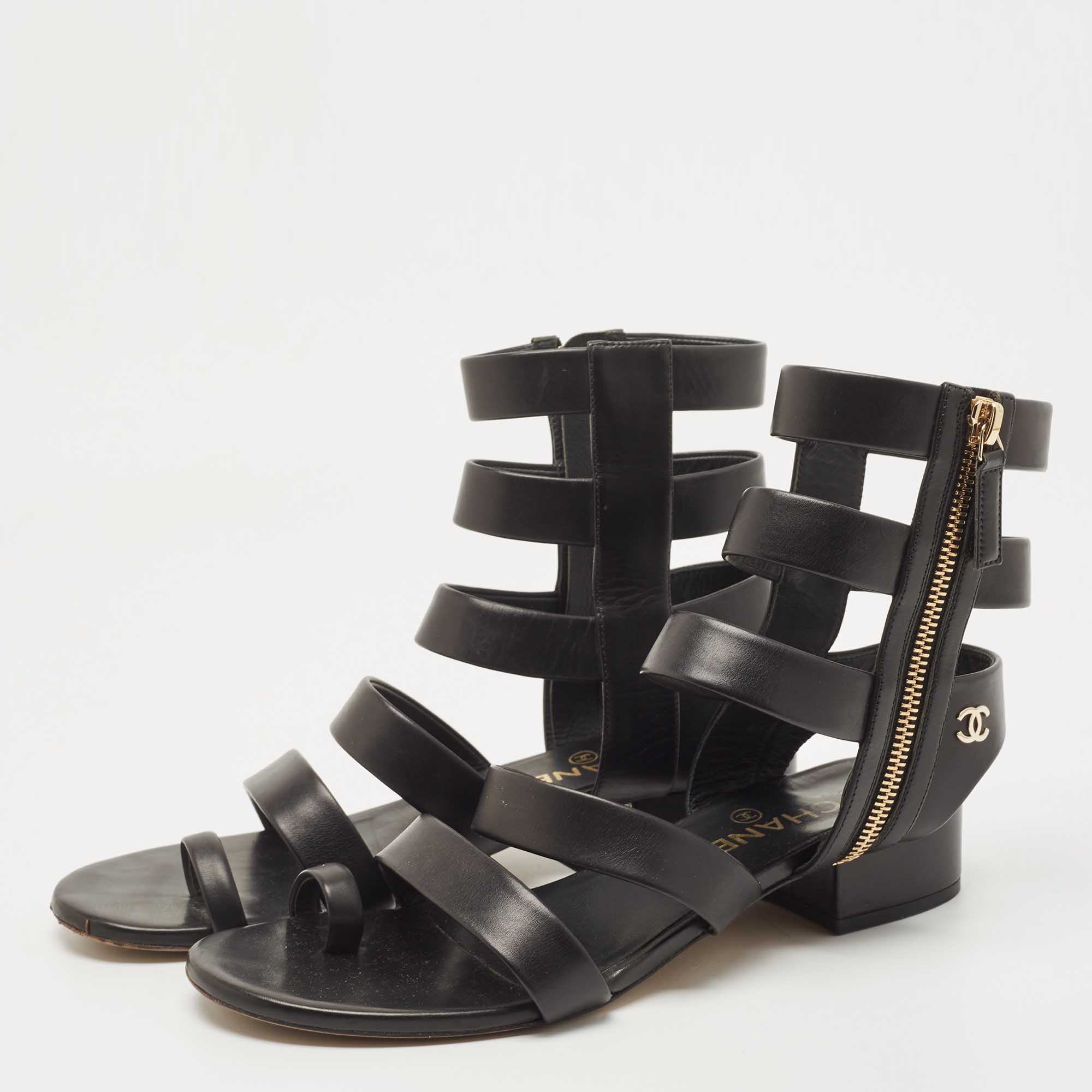 

Chanel Black Leather Interlocking CC Logo Gladiator Sandals Size