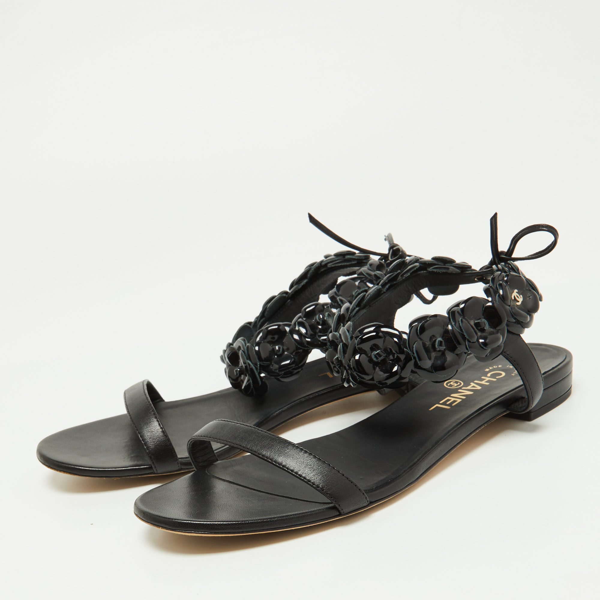 

Chanel Black Leather Camellia Ankle Strap Flat Sandals Size