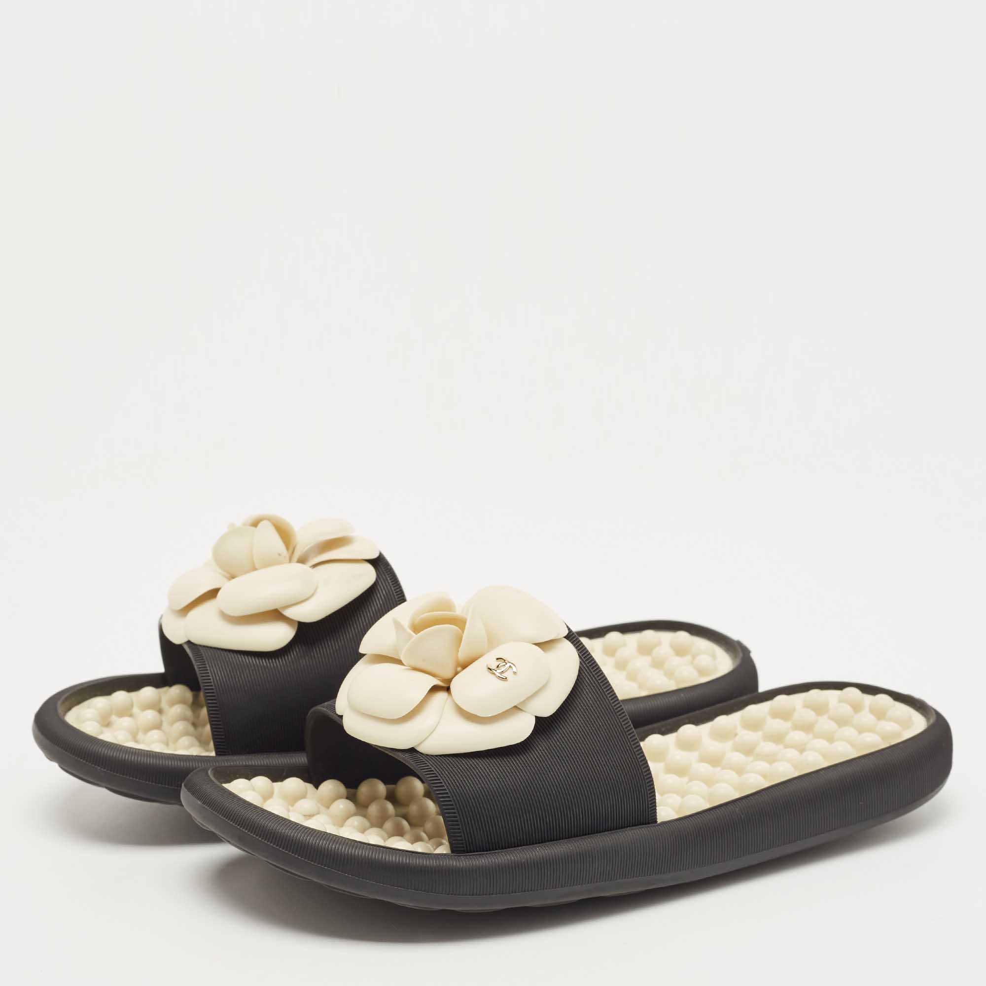 

Chanel Black Rubber CC Camellia Flat Slides Size