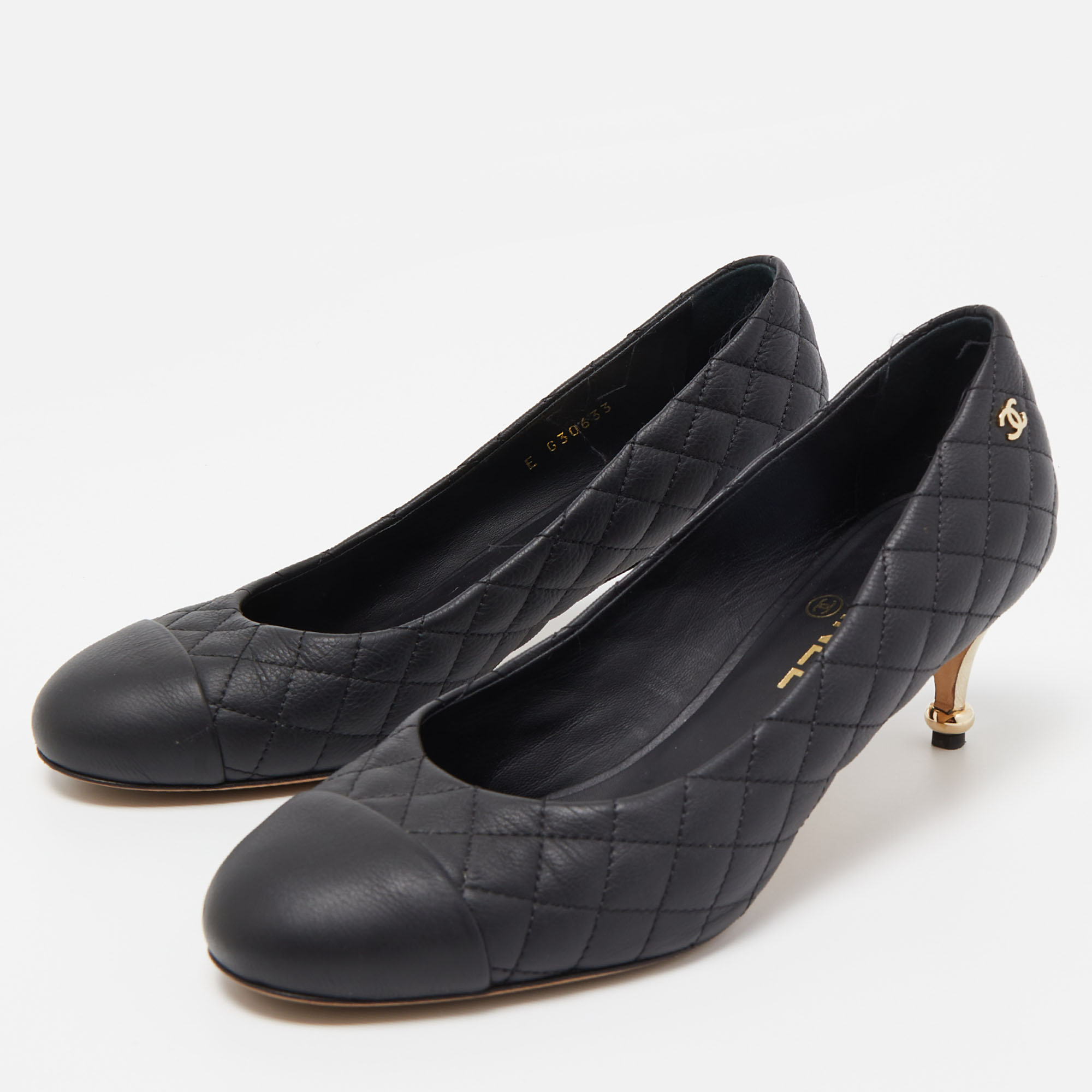 

Chanel Black Quilted Leather CC Cap Toe Pumps Size