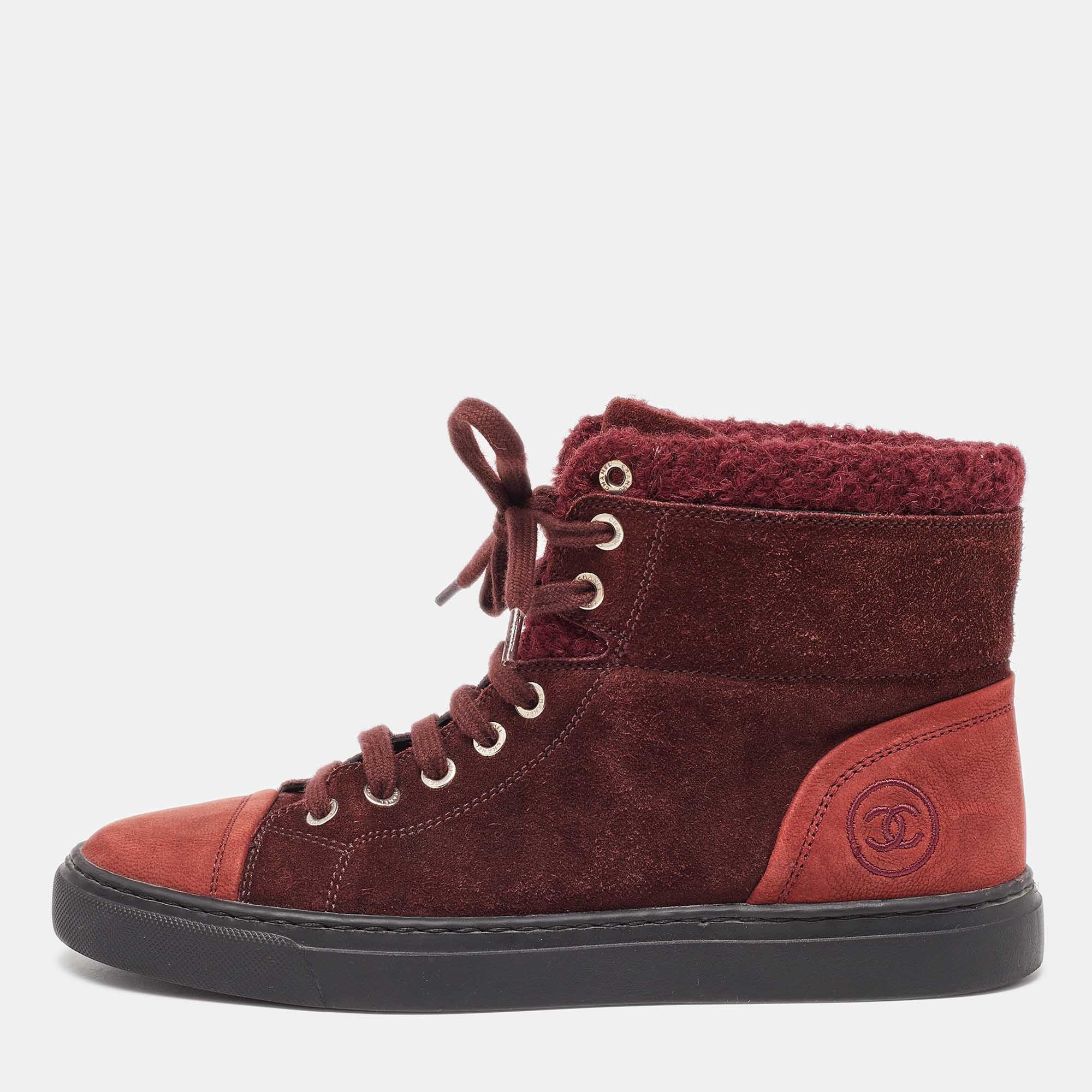 These Chanel sneakers are warm and gorgeous Theyve been carefully crafted from a mix of suede and designed with wool trims lace up vamps and the CC logo. You are sure to feel fashionable in this pair.