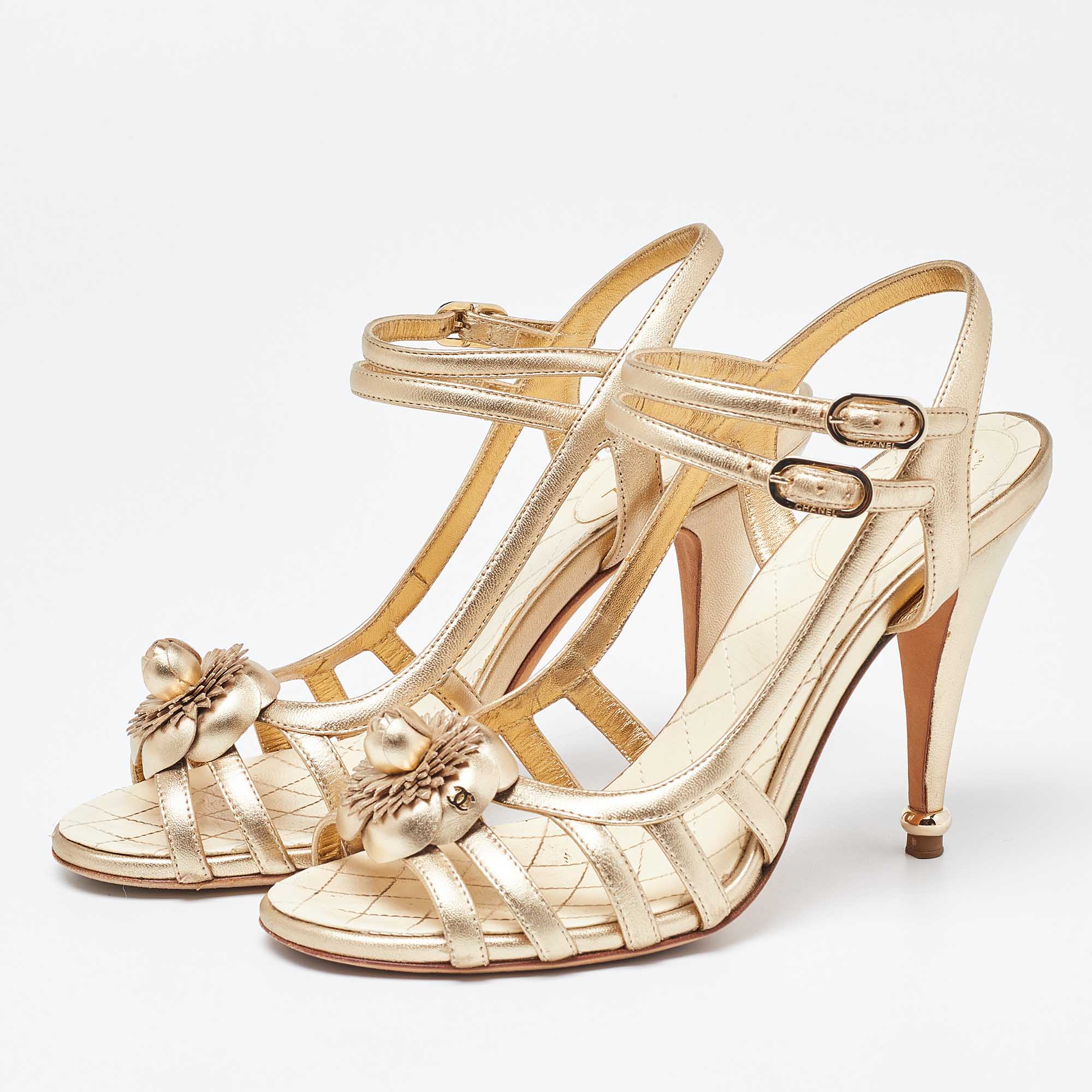 

Chanel Metallic Gold Leather Camellia Ankle Strap Sandals Size