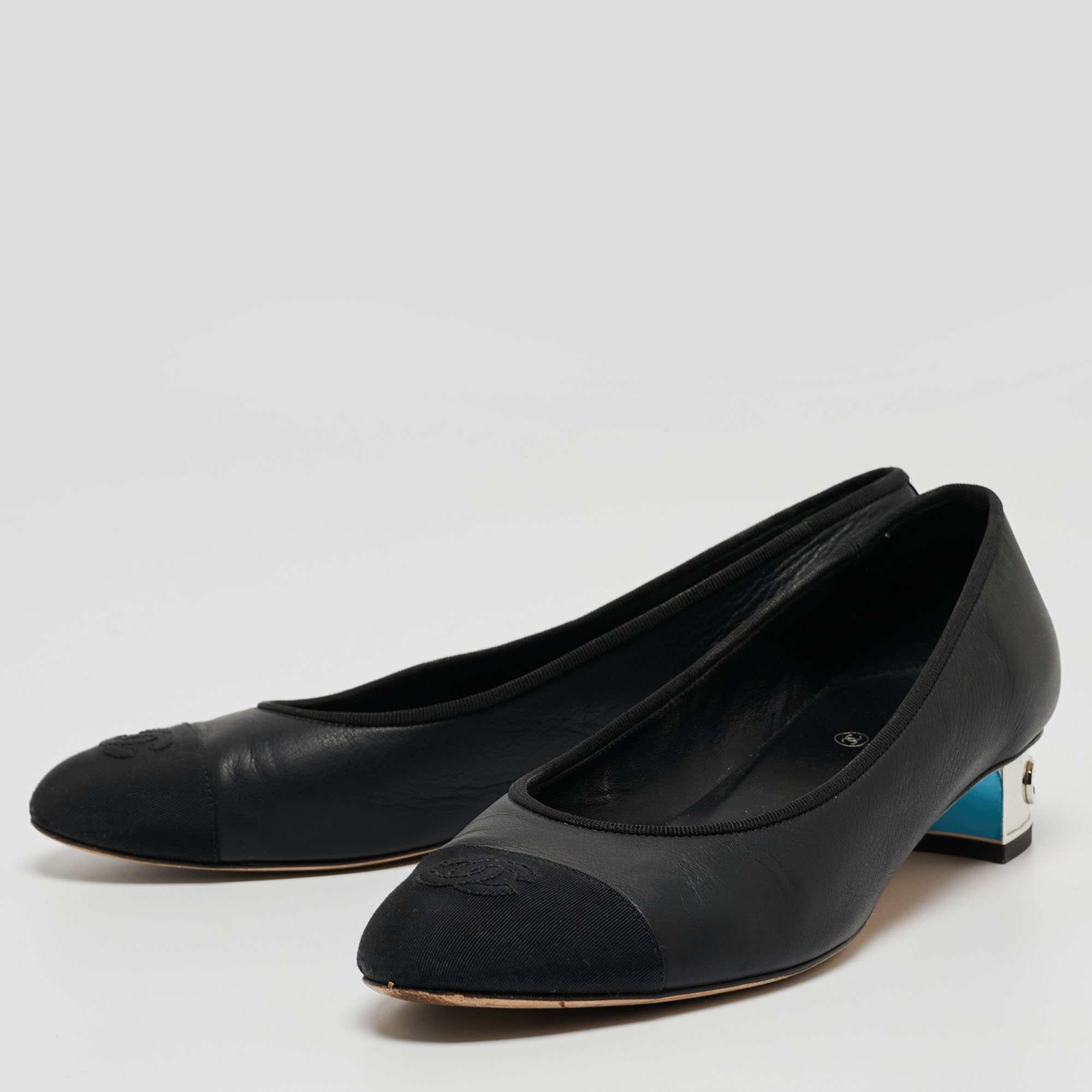 

Chanel Black Leather and Canvas CC Cap Toe Pumps Size