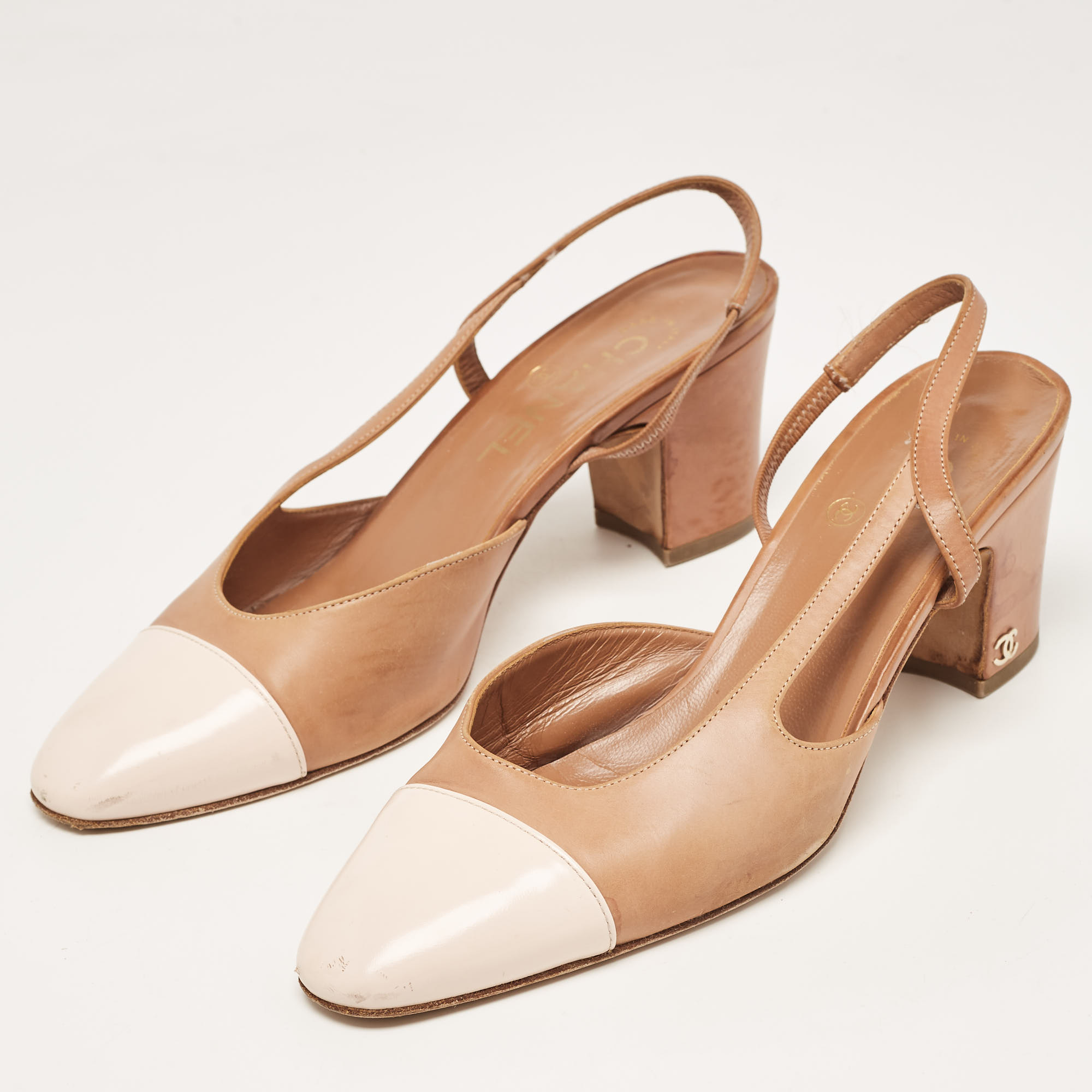 

Chanel Beige/Cream Leather CC Elastic Pumps Size